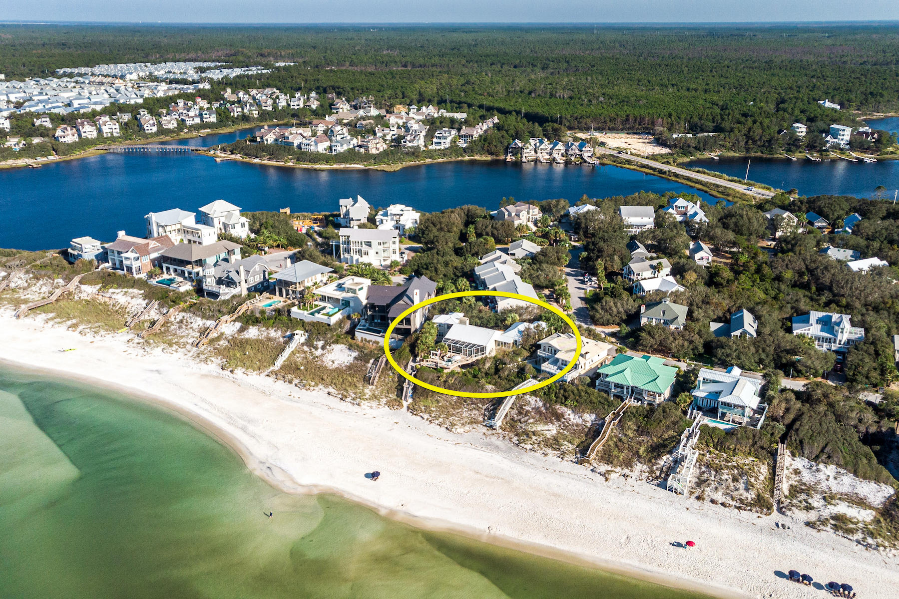 Impressive beach-front compound in a private, low-density community located on the east end of Scenic 30A in South Walton County, Florida, peacefully oriented on a peninsula between the Gulf of Mexico and the scenic, and rare, Coastal Dune Lake, known as Camp Creek Lake! This extraordinary estate includes a 3-bedroom, 3-bath main home, which was beautifully renovated in 2007, a 1-bedroom, 1-bath carriage home, garage, and secluded pool, all of which would be conducive to a primary home or secondary coastal retreat, or perhaps a robust income-producing asset for an investor who could also enjoy occasional use. Carefully designed to maximize the stunning setting, the home features gorgeous water views from the family room and kitchen, as well as the master suite. In addition, it offers... fabulous outdoor living spaces, including a fully screened deck area and additional open, terraced decks that are ideally integrated into the dune structure, which offers convenient access to the Emerald Coast's brilliant white sand and sparkling waters of the Gulf of Mexico. Both interior and exterior spaces provide excellent  entertaining venues, or perhaps you'll prefer to nurture your solitude at this quiet seaside sanctuary to decompress from city life. Either way, your privacy is protected, as not only is the community private, but this compound has its own gated entry as well. This beachside estate is nearby to exceptional dining, entertainment, and shopping, as well as within a convenient drive to Northwest Florida's Beaches International Airport (ECP) for your commercial or private flights. Please inquire for further details, and to schedule a private showing. Showings may commence on or around November 8, 2020. Interior photography will be uploaded to this listing on or around November 8, 2020. The recorded plat is uploaded to this listing under the Documents tab.