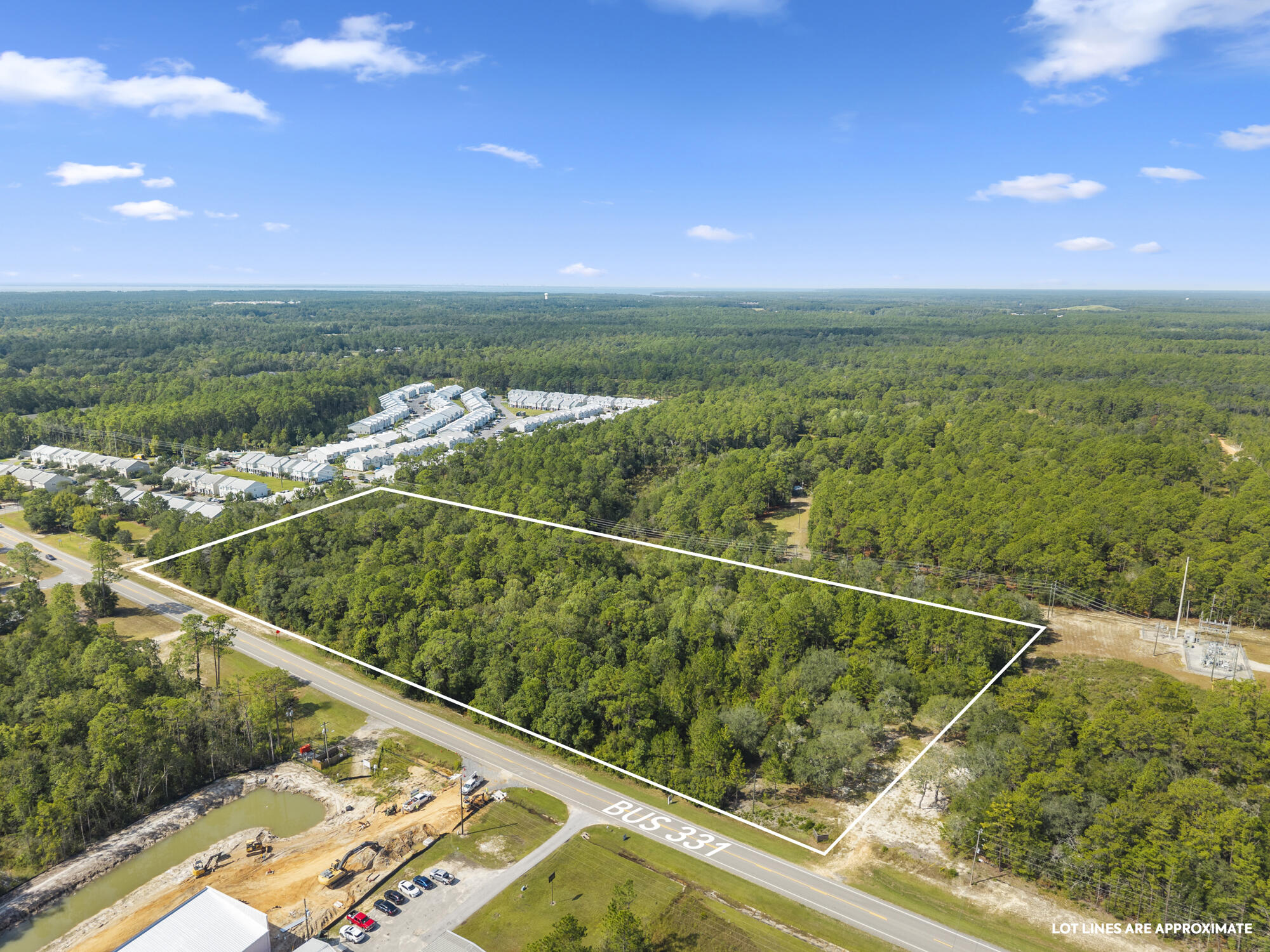 Introducing an exceptional opportunity to own a prime piece of real estate in the rapidly growing city of Freeport, Florida. This expansive 11.44-acre property, consisting of two combined parcels, is ideally situated along US Highway 331 and is zoned R-3 for multi-family use. The property comes with a Development Order (D.O.) approved for 128 apartment units, along with building plans and surveys offering a rare, shovel-ready opportunity ideal for developers and investors alike. 

The location provides excellent visibility and accessibility along the bustling US Hwy 331 corridor, surrounded by a mix of residential and commercial growth. Just minutes from downtown Freeport, local schools, shopping, and essential services, the property is also within easy reach of the beautiful Beaches of South Walton, Interstate 10, and Highway 98.

This is a prime development opportunity in one of Walton County's fastest-growing markets, where the demand for quality multi-family housing continues to rise. Inquire today to learn more. Buyer to verify all information deemed important.