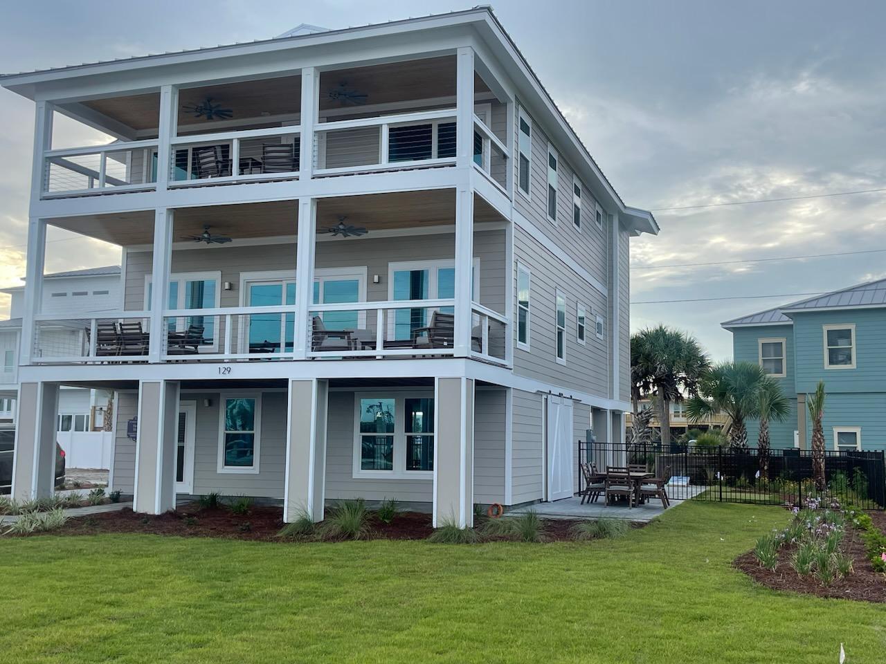Come see, ''Plan Sea,'' the newly completed premier home in Mexico Beach....literally, just steps to the famous white sand and turquoise waters you love.  This home has everything you could wish for, 6 bedrooms, 7 bath in 3386 Sq. Ft.  It has an impressive outdoor recreation area which includes a heated salt water pool, lounging space for TV watching, a ping pong table, cornhole toss game, grill area, picnic table, and a putting green. This well built home has Hardi-board siding and impact windows and doors.  The new owners will have awesome water views from many rooms and balconies. Home faces west so you can enjoy sunsets Mexico Beach is famous for.  Step into the ground floor entry and head out the side door to the outdoor entertainment area.  Leave the barn doors open to enjoy the summer breeze or pull them shut on chilly days.  At the top of the stairwell is the main living space with a spacious kitchen, dining area, and living room, plus you will find the powder room, laundry and two guest rooms with ensuite baths on this floor. The 3rd floor hosts 4 more bedrooms, each having it's own ensuite bath.  The Primary bedrooms have doors that lead to the spacious balconies. This is a custom built home with quality materials, such as all wood cabinets, quartz countertops, farmhouse sink, tiled backsplash, tiled showers, LVP flooring, stainless appliances, paved patio and driveway. Home is being sold fully furnished and rental ready.  If you are tired of over crowded beaches then check out Mexico Beach, just 30 miles east of Panama City.  We have the plan for you.......... it's "Plan Sea"!