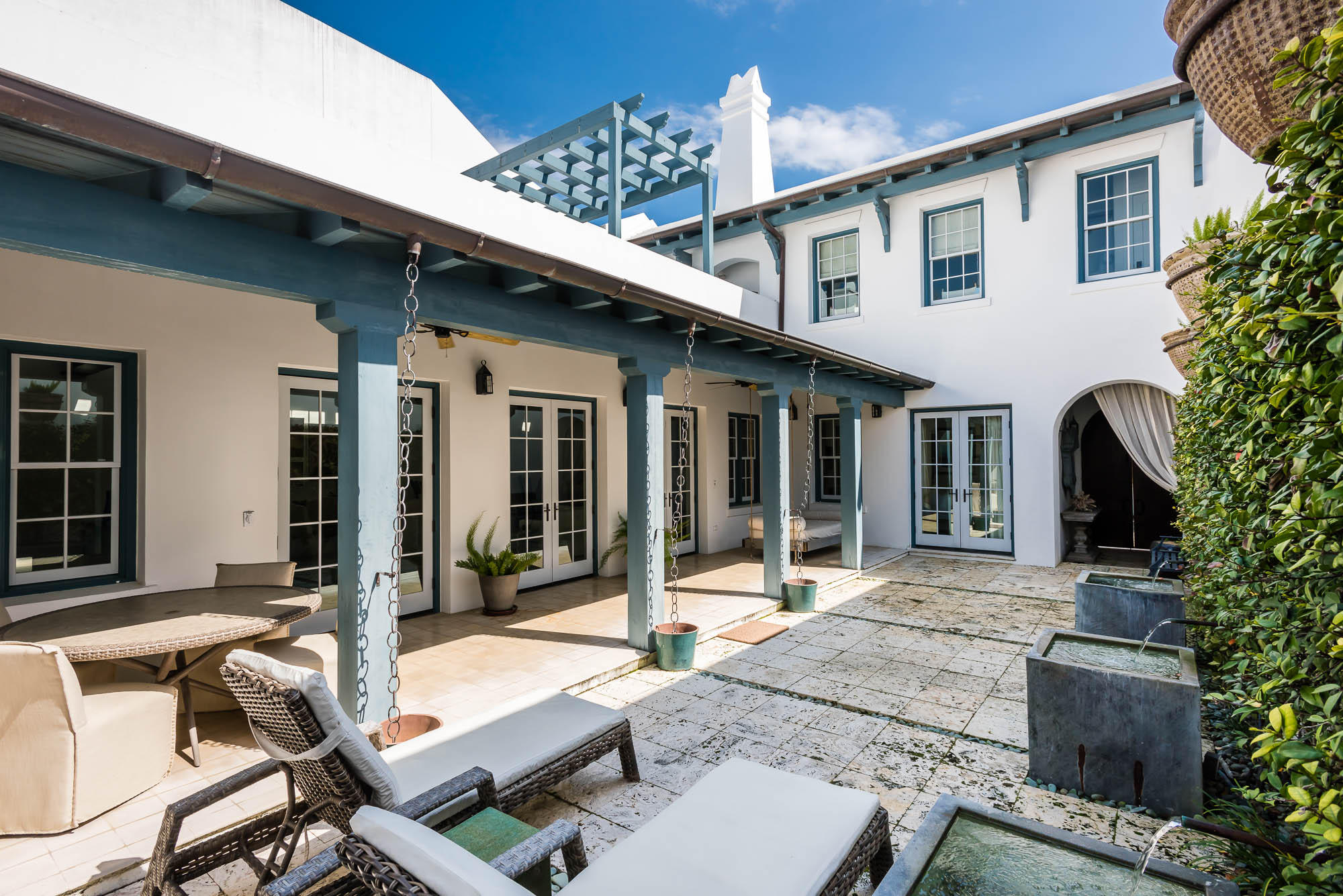Enjoy summer nights from the rooftop terrace of this 2,436 square foot Alys Beach home. Its location on the pedestrian path, Sea Garden Walk, is just a short stroll from the beach access to the south and Lake Marilyn to the north. The first floor master suite and guest suite open to the spacious courtyard and sounds of the bubbling fountains. The second floor guest suite enjoys a very private loggia that overlooks Sea Garden Walk. Professional interior designs are appointed by the Musso Design Group from Atlanta, GA. This home is green outfitted with terrazzo floors, reclaimed wood on the second floor, dual-flush toilets, an ultra-efficient and durable hot water tank, a heating & cooling system that shuts off when windows/doors are left open, and terrace sky lights for extra lighting. 44 Seven Wells Court was awarded the AIA Chicago Sustainability Design Excellence Award and is built to FORTIFIED for Safer LivingÂ® standards.