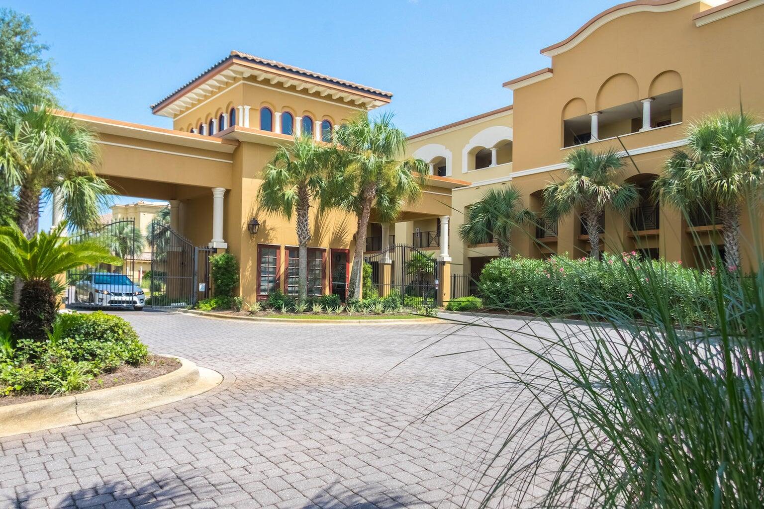 Experience the best of 30A living at Sanctuary by the Sea! This beautifully designed 4-bedroom, 4.5-bath condominium offers an exceptional blend of luxury and coastal comfort. With over 2,200 square feet of living space, this residence features high ceilings, travertine flooring, a gourmet kitchen with Viking appliances, granite countertops, and custom cabinetry. The open-concept floor plan flows seamlessly into a spacious living and dining area, perfect for entertaining or relaxing after a day at the beach. Step outside to a large private balcony overlooking the natural coastal dune lake, offering serene views and incredible sunsets. The primary suite boasts a spa-like bath with double vanities, a soaking tub, and a walk-in shower. Each guest bedroom offers en-suite baths, ensuring privacy and comfort for the family and friends.  Sanctuary by the Sea is a gated, low-density community set on 23 acres with direct beach access. Resort-style amenities include three pools, two hot tubs, a fitness center, an owners' lounge, a theater room, outdoor grilling areas, and boardwalks to the sugar-white sand of the Gulf. Enjoy kayaking or paddleboarding on the coastal dune lake or biking along Scenic Highway 30A to nearby dining, shopping, and entertainment in Blue Mountain Beach, Seaside, and Grayton Beach. This residence is the perfect choice for a full-time home or second home.  Condo does include remote screens on first floor balcony for screened porch.