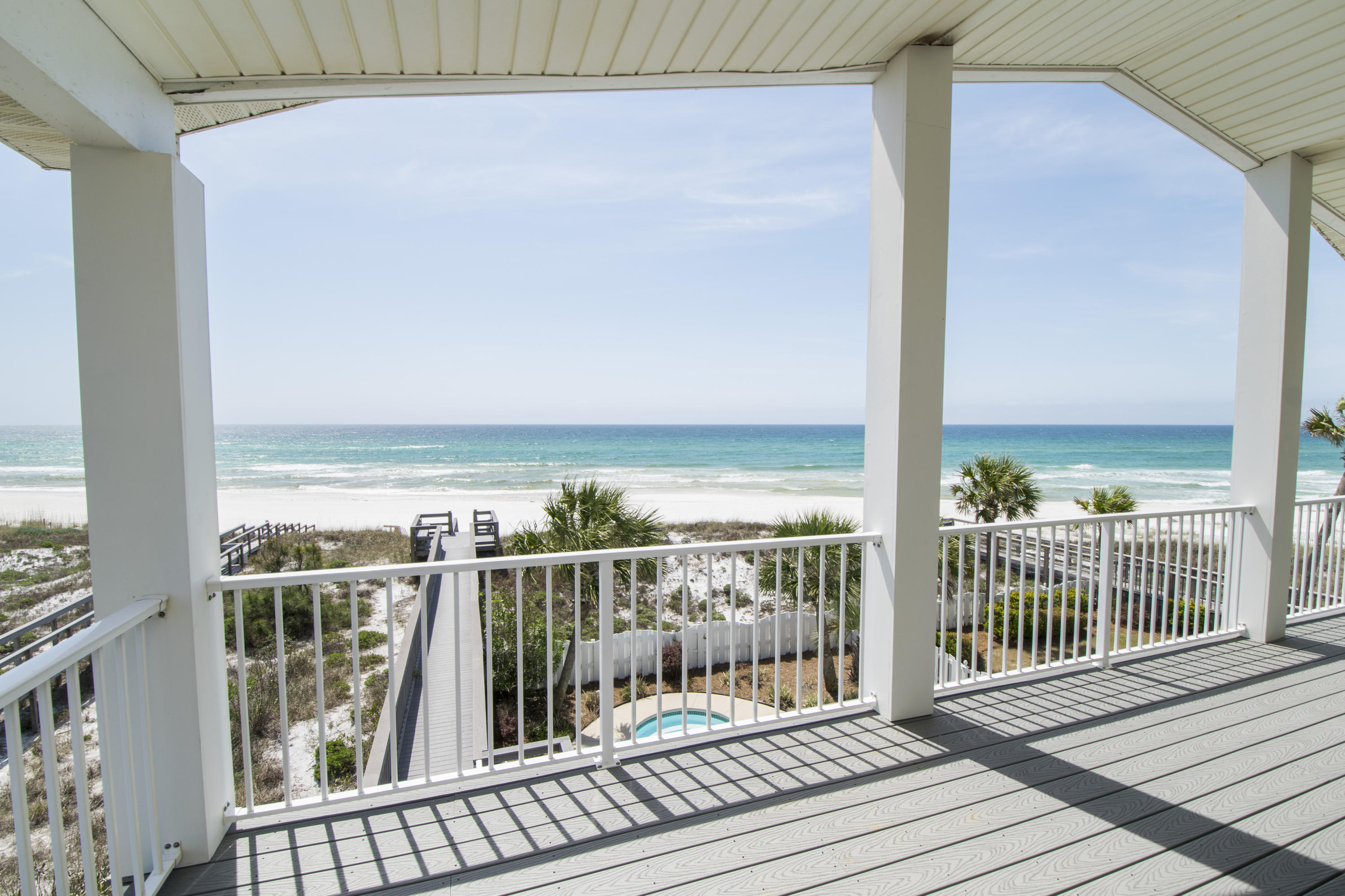Welcome to a coastal waterfront haven in Inlet Beach - Aurora House. This immaculate four story, 5-bedroom, 5-bathroom, Gulf-front beach house boasts 2,535 square feet of paradise living and accommodates 18 guests comfortably. This home sits on one of the best Gulf-front lots in Inlet Beach that is 413 feet deep, has a private pool and private beach boardwalk. Beautiful Gulf views available from the living room, kitchen and master bedroom, and panoramic views from the top floor!
This home features an open floor plan and is being sold fully furnished and decorated. Interior features include ceramic tile in the living areas and bathrooms, plush carpeting in bedrooms, plantation shutters, custom window and door molding, and coastal off-white paint.
  The second-level living area is open to the dining area and kitchen and features a wall of sliding doors overlooking the Gulf of Mexico. Subtle coastal dÃ©cor allows the Gulf views to be the focus in this modern living space. An auburn tone tile flooring adds elegance throughout the living and kitchen areas. Other features of the living area include a flat-screen TV, two queen-size sofa beds and two twin-size sofa beds, perfect for movie nights after a long day at the beach. 
The kitchen features stainless electric appliances, granite countertops, white cabinetry, a modern glass back splash and access to a balcony overlooking the driveway and mature palms. Adjacent to the kitchen is the dining area, with a large distressed wood table which seats eight guests in the high back wicker dining chairs. For additional seating, there are matching barstools at the nearby breakfast bar. A rustic metal chandelier adds a unique feature to the dining room. 
The third-floor master suite features vaulted ceilings, a king bed, twin-size sofa bed, private balcony, and en-suite bathroom. The bathroom includes a tiled walk-in shower, large garden tub, two separate vanities and lots of natural lighting. The private balcony offers panoramic views of the emerald waters of the Gulf, two comfortable lounge chairs and a high-top table with chairs â€“ a great place to escape and enjoy quiet and peaceful coastal atmosphere. 
The private Gulf-front yard is enclosed by a beautiful scalloped fence and encompasses a private swimming pool. There is also an outdoor shower, built-in grill, patio swing, rockers, lounge chairs and other patio furnishings, providing many opportunities to enjoy Florida's weather. The composite decking on the back covered balconies and patio provide easy maintenance â€“ no yearly sealing and staining required!
A guest bedroom with a queen bed and full bathroom are on the second-level, near the kitchen. The bathroom features a marble vanity and tub/shower combo. This bedroom has access to a balcony overlooking the driveway. Two additional guest bedrooms are on the third floor. One has a king bed and the other has two twin beds. Both bedrooms have an attached bathroom. The final guest bedroom is located on the first floor and offers a queen bed and attached full bathroom. Just outside this bedroom is an elevated porch with a gorgeous view of the pool and the Gulf of Mexico.
On the fourth floor, is a quaint bonus loft area with panoramic windows overlooking the Gulf of Mexico. This is great a great area for reading, relaxing or a game area for the kids. 
The charming cobblestone-style driveway lined with palm trees and manicured landscaping leads to the two-car garage and storage area. This home exudes Florida style with a sunset yellow stucco exterior, walnut and white trim work and slate a tile roof.
Other features of this spacious home include a large laundry room with full size washer and dryer, utility sink and additional storage. All bedrooms and the living area feature coastal palm style ceiling fans.
Aurora House is located close to Camp Helen State Park and the coastal dunes lakes of South Walton County. Panama City's Pier Park shopping, dining and entertainment are just minutes away. Just a few miles west, you'll find lots of local great shopping and dining in Seaside, Rosemary Beach, Alys Beach and along Highway 30A.  
This amazing Gulf-front home is waiting to be your piece of paradise! Schedule a private tour of this beautiful Â¬spacious home today.  All information deemed to be correct - buyer to verify