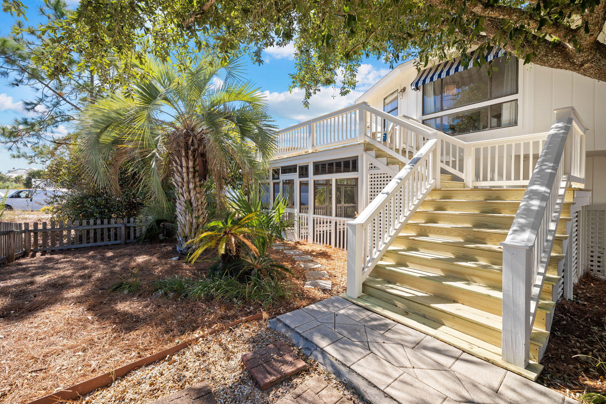 Under contract, but with a 72 hour kick out clause. Showings encouraged. This bijou beach cottage is simply brimming charm and character. Within the octagonal exterior you'll find spacious open living areas on both the first and second floors with new flooring, fresh lighting and updated bathrooms. If you're looking for open-air living, step out onto the newly built wraparound deck, which has a generously sized area for sunbathing, reading, dining and relaxing. This unusual home is not short on space inside with a remodeled family kitchen boasting quartz countertops, a pantry and stainless appliances including a French door refrigerator. There's a formal dining area and two beautiful bedrooms on this upper level enjoying panoramic views across the Old Grayton neighborhood. Two renovated baths give everyone their own private morning space. A spiral staircase leads down to a haven where guests/kids have their own spacious bedroom, den and bathroom. There's a kitchenette/wet bar complete with beverage refrigerator for keeping drinks perfectly chilled. A screened porch offers more dining and entertaining space overlooking the bubbling pool and landscaping. The paved pool terrace makes this home easy to maintain and provides quality space for barbecues and chilling out in the private fenced yard. This is a home for those who shun cookie-cutter style conformity and want a fun vacation home without sacrificing comfort and quality. Suitable for rentals, it has parking for several vehicles and is within easy reach of several beautiful beaches. Nearby 30A connects local eateries and shops with recreational opportunities in Point Washington State Forest and Grayton Beach State Park. As a vacation home with superb rental potential, this eclectic property has it all.