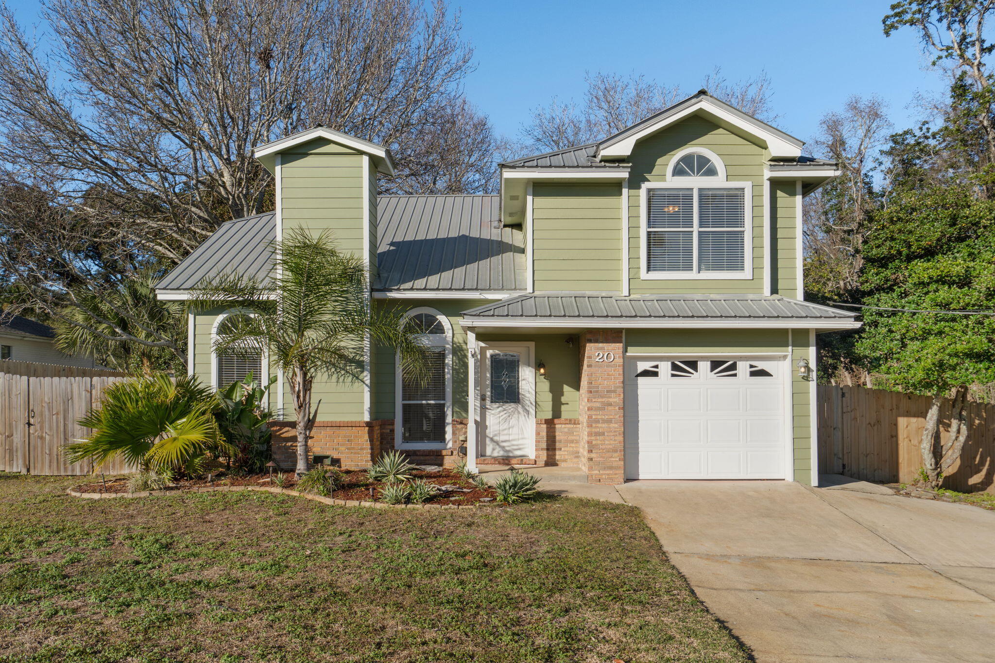Located on one of Shalimar's established and desirable coastal streets, 20 Meigs Drive is a 3-bedroom, 3-bath home offering space, privacy, and the convenience of everyday living in a quiet neighborhood away from tourist traffic. The open-concept downstairs layout flows seamlessly between kitchen and living spaces, creating a functional and comfortable environment. The kitchen has been thoughtfully updated. Fresh paint and new carpet throughout enhance the clean, modern feel. Set on a large lot with a fully fenced backyard and no HOA, the home combines flexibility, comfort, and easy access to top amenities--just 5 miles from the white sand beaches, less than 3 miles to Eglin's West Gate, and minutes from Shalimar Harbor Marina for boating and waterfront recreation. Additional features include a garage for parking and storage, a screened porch ideal for enjoying the outdoors year-round, and a backyard storage shed for added convenience. The spacious fenced yard provides room for play, gardening, or future enhancements such as a pool or expanded patio area. The generous lot size adds both breathing room and long-term versatility.

Nearby amenities include Meigs Park with its boat ramp and bay access, Shalimar Harbor Marina for larger vessels, and convenient access to shopping, dining, and top-rated schools. The location balances everyday practicality with the relaxed character of coastal living.