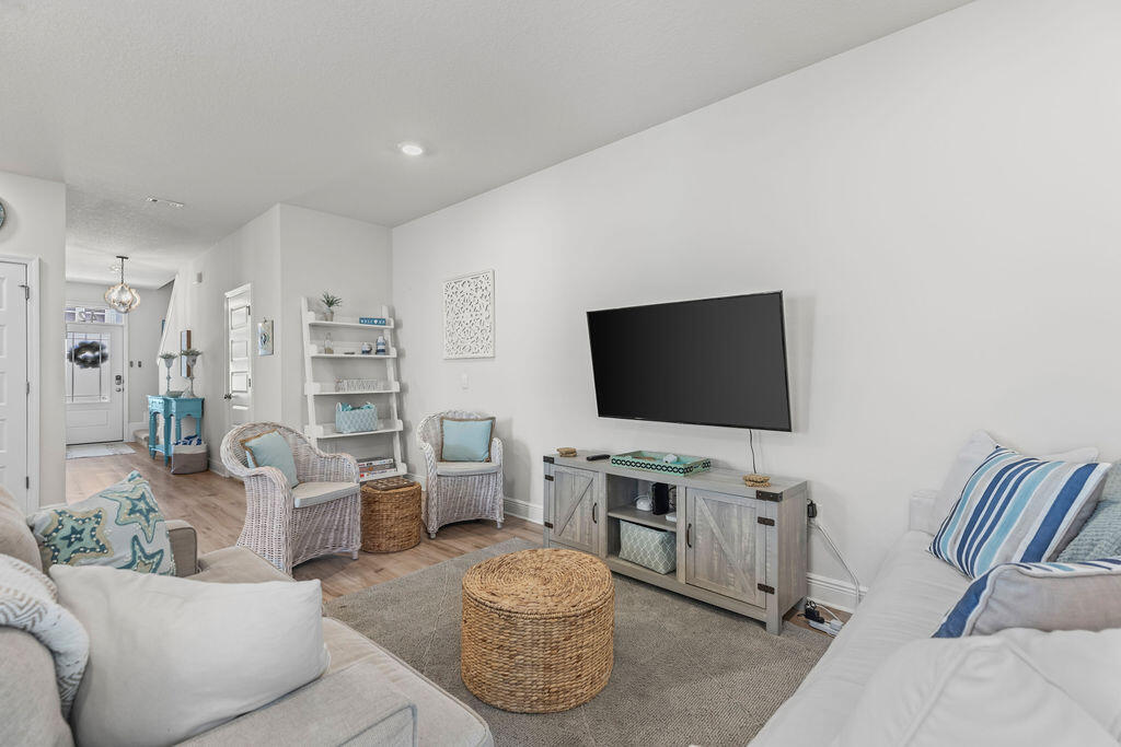 Fully furnished 3-bedroom, 2.5-bath townhome available for a 6- or 9-month lease in Santa Rosa Beach. Conveniently located just minutes from Scenic Highway 30A, Grand Boulevard, dining, shopping, and the beaches of the Emerald Coast. This well-maintained home features an open living and dining area, a fully equipped kitchen with full-size appliances, and a private patio with gas grill.
The primary bedroom includes a king bed and ensuite bathroom, the second bedroom offers a queen bed, and the third bedroom features a full-over-full bunk bed. Additional features include high-speed WiFi, smart TVs, washer and dryer, central A/C, and a ping pong table in the garage.
Small dogs up to 50 pounds welcome with a pet deposit. Private parking included.