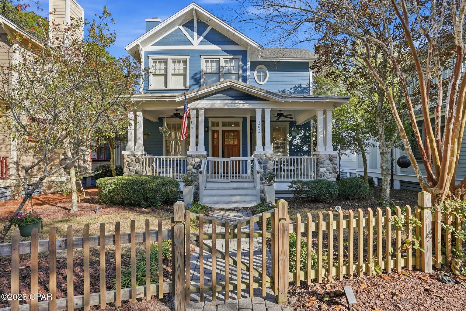 Welcome to a home where modern design meets relaxed coastal living. This stunning Craftsman-style bungalow was completely remodeled in 2023 offering a fresh, move-in-ready home with nothing left untouched. Updates include a brand-new HVAC (2025), luxury vinyl plank flooring throughout (2025), quartz countertops, new cabinetry, newly tiled showers and backsplash, updated lighting, select new stainless-steel appliances, a newer roof in stalled in 2023, and an expanded driveway along with many other thoughtful upgrades. Set within the gated community of Wild Heron, owners enjoy access to resort-style amenities such as a boathouse, fitness center, inviting fire pit, scenic nature trails, a dock on Lake Powell, and a beautiful pool and hot tub. This is a rare opportunity to own your own slice of paradise, with an optional Watersound Club membership offering golf and tennis at Sharks Tooth and Wild Heron