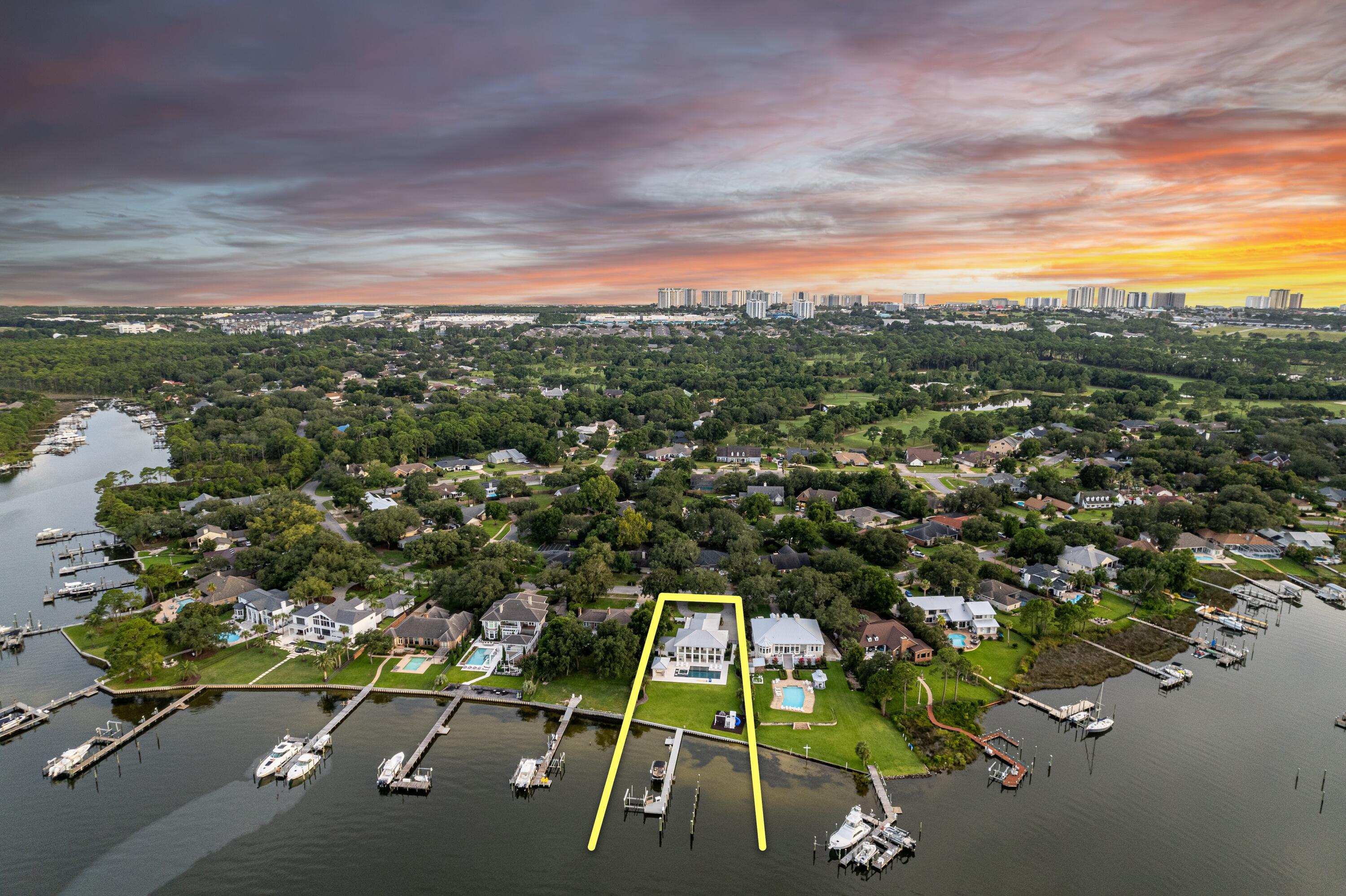 Extraordinarily Renovated, Deep-Water Estate on Indian Bayou in Destin, Florida!  This spectacular trophy property has been meticulously renovated throughout its interior and exterior.  The ±.68-acre lot is superb, expanding ±127' across Indian Bayou offering a unique dimensional perspective and view corridor across Indian Bayou to the scenic Choctawhatchee Bay.  The gorgeous landscaping and fabulous legacy trees display wonderful ambiance from the streetscape all the way seaward; lush green grass with the backdrop of the unmistakable, gorgeous water indicative of the Emerald Coast of Florida, portraying a storybook setting. Instead of hassling with offsite boat mooring and/or storage, this opportunity offers ownership the convenience of immediate access to their yachts, sport fishing boats, and pleasure craft, directly behind their newly renovated home; few properties in the Destin market offer like-kind, year-round navigability for such large boats.  The peaceful, tranquil setting in the Golf community of Indian Bayou precludes short-term resort rentals and tourists, thus providing a more grounded, community feel and spirit amongst full time ownership.  Please inquire for further details and to schedule a private showing.