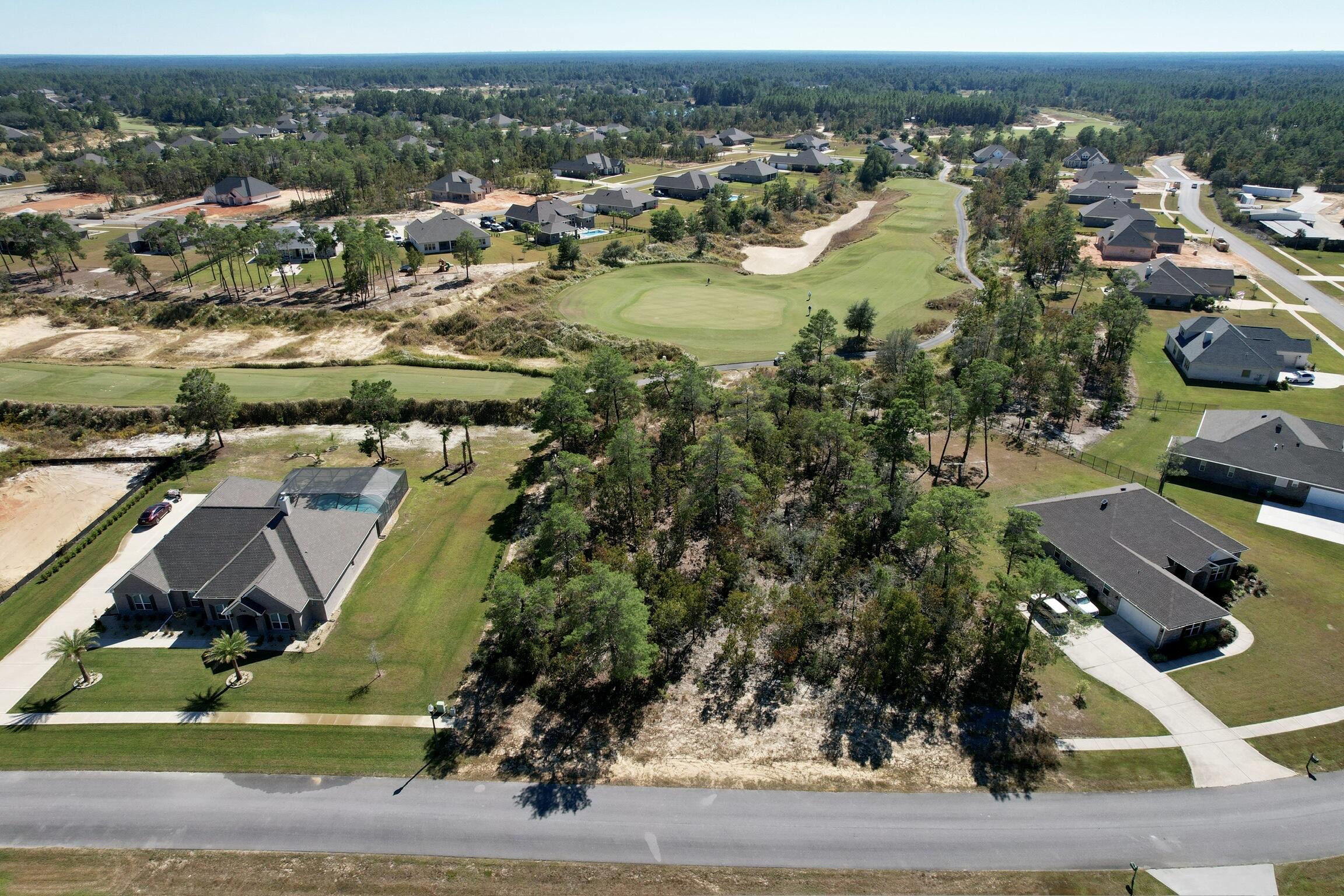 Build your dream home on this spacious 0.75-acre residential lot located in Freeport's premier gated golf course community Windswept Estates. Nestled behind the green of Hole 6 this property offers scenic golf course views. Enjoy morning coffee or evening sunsets with panoramic vistas of lush fairways and the peaceful surroundings of Walton County. The flat terrain provides the perfect canvas for a custom home, with ample room for outdoor living spaces, a pool, or garden retreat. Your new home will be less than a half hour from the sugar sand beaches on the Gulf of America, 30A, and the luxury shopping that South Walton has to offer. Whether you're planning your forever home or a serene second residence, this exceptional lot offers the perfect blend of luxury living and small-town charm **Community Features:**
 Gated entry for added privacy and security
 Championship 18-hole golf course
 Community pool, tennis courts, clubhouse & more
 Just minutes from the beaches of South Walton and Scenic 30A
 Convenient access to Hwy 331 and nearby shopping, dining, and schools