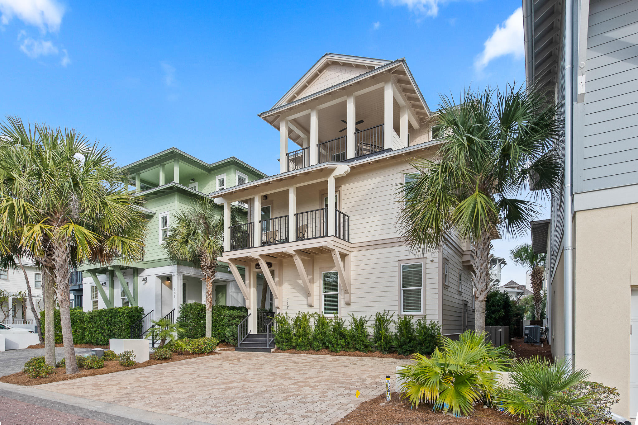 RECORD HIGHEST SALE PRICE IN WATER'S EDGE COMMUNITY HISTORY OF ANY NON-GULF-FRONT HOME. Only four rows from the beach in the exclusive gated community of Water's Edge, this home's superior design, construction, and location combine for the perfect beach retreat less than fifty yards from the beach and only three minutes on foot from the Rosemary Beach Town Center. A gourmet kitchen, private back yard with pool and spa, ample living areas, and expansive outdoor space combine to invite large groups to gather comfortably. Five large bedrooms, all with private or semi-private baths, offer sleeping space for 14. The home is a reliable rental performer, with over $190K in revenue booked for 2021 as of March 26. The well-appointed kitchen, located on the ground floor, features granite  countertops, a large Wolf gas cooktop, a 48-inch Sub-Zero refrigerator, double Wolf convection ovens, plus microwave, ice maker, and dishwasher. The kitchen opens to the large main living/dining area with ample seating for all. High ceilings and large windows overlooking the pool area create a bright, airy feel. On the ground floor you will also find one of the home's two junior master suites plus an additional half bath. Throughout the entire home are beautiful tile floors, chosen for their appearance and durability.

The spectacular main master suite on the second floor opens to a large private balcony overlooking the pool and boasts an expansive bathroom with granite countertops, double vanities, soaking tub, and shower with a built-in bench. Attached to this bedroom is a private office that overlooks the pool. This office is multi-functional, as it can be used as a quiet reading space, work area, or nursery/young child's sleeping area.  This level is also home to the second junior master suite, which opens onto a private balcony of its own. The junior master bathroom also has a luxurious bathroom, with double vanity, granite countertops, and a large glass-enclosed shower. Rounding out the second floor is the bunk room, where you will find built-in twin-over-full bunk beds; a private bath with tile shower adjoins the bunk room. A large laundry room is situated on the second floor for maximum convenience.

The third floor's large bedroom, the home's fifth, is home to two queen beds and a semi-private bathroom, which also adjoins the large secondary living/media area. The media area opens onto the largest of the home's balconies, overlooking the pool and spa, with another large balcony offering wonderful sunset and Gulf views. Fortunately the wet bar is also on the third floor, so you can enjoy the views and breezes without going downstairs for refreshments.

Water's Edge is a gated community adjacent to Rosemary Beach on 30A's chic east end. Walk or bike down the tree-lined path along 30A to nearby Rosemary Beach, Alys Beach, or Seacrest Beach, or simply enjoy the private neighborhood beach access less than 50 yards from the home.