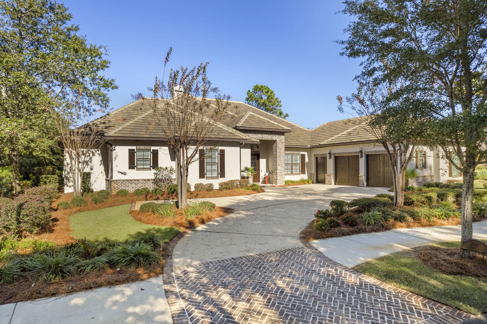 Beautiful custom built, lakefront residence overlooking the Burnt Pine Golf Course inside the gates of Sandestin.  This stunning, quality home is ALL ON ONE LEVEL!  Peaceful, serene views from this truly special offering, perfectly situated on 110 feet of lake front property. The Spacious Master Suite opens to a separate screened outdoor living space.  Chef's dream kitchen and main living area also open to screened outdoor areas, perfect for maximizing views and for entertaining year around.  Summer kitchen, Impressive wine room, separate dining room, separate study with built in desks for two, butler's pantry, cypress ceilings and ample storage are just a few of the many features found within this lovely home.  Includes a golf cart, and is offered furnished with just a few exceptions.