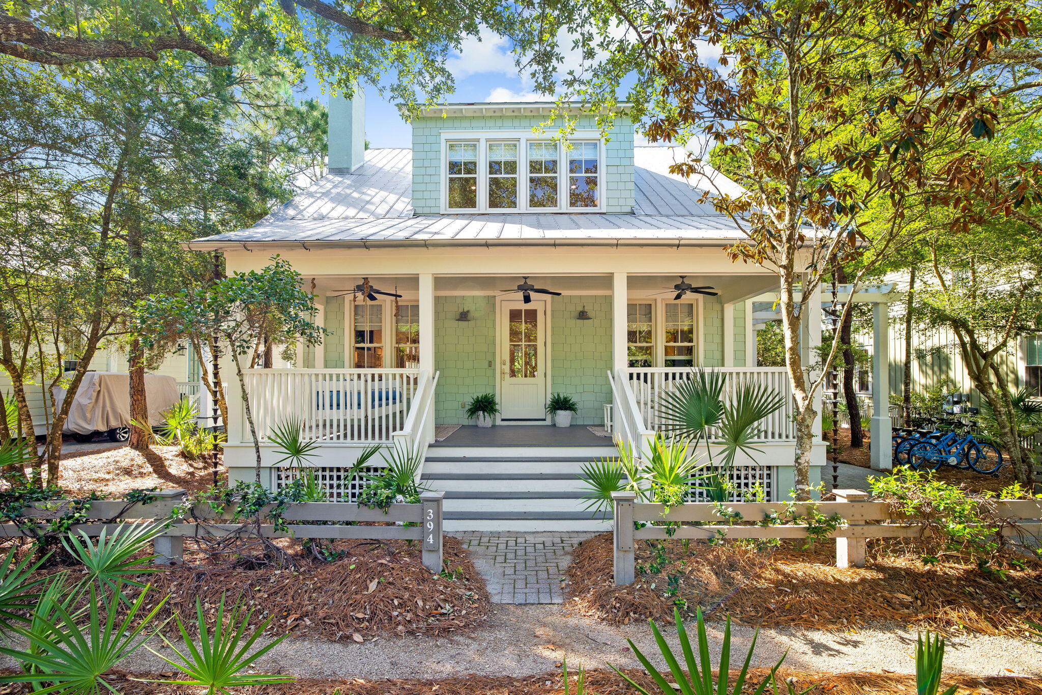 Welcome to this gorgeous Phase 2 WaterColor home. Imagine owning a property in one of the most desirable locations in WaterColor. This home has been recently refreshed with paint and new furnishings but still retains a true Florida cottage feel. This lovely beach home offers coastal charm and a spacious floor plan. Located just minutes from Camp WaterColor, children and adults are sure to enjoy the pools, slides, a lazy river, playground, basketball court, and poolside cafe. WaterColor offers a total of 9 pools, 5 tennis courts, 2 pickle ball courts, Boat House for water rentals, Bike Barn, Lake House and outdoor Amphitheatre for events, trails and parks, an Award-winning Beach Club, shops, restaurants, and so much more. Featuring three bedrooms and three bathrooms, this WaterColor cottage is situated on a large lot located on a peaceful street that backs up to a nature preserve. Conveniently located adjacent from this home is a beautiful park and bocce ball court. Wide covered porches welcome you into a charming natural light felt space with cottage plank pine walls, cedar beam ceiling, and beautiful pine wood floors throughout. As you enter the home you are greeted by a spacious but cozy living area that overlooks a lovely gas fireplace. The open kitchen features quartz countertops, and freshly white painted cabinets. An elegant main bedroom is also located on the first level and has access to a full bath with walk in shower. The second level offers two additional bedrooms each with ensuite baths. The spacious owner's suite has a king bed, walk-in closet, bonus office space, dual vanities, soaking tub, and walk in stone shower. The additional bedroom features 4 bunks and a fun bonus room for additional sleeping arrangements, games, movies, or a private reading nook. 

WaterColor offers a unique blend of amenities and natural beauty. Set on 499 acres, Watercolor features an award-winning Beach Club located along the beautiful Emerald waters and white sandy beaches. The Beach Club offers 3 pools, a poolside restaurant, and the most amazing sunsets. WaterColor is one of 30A's most desired communities and is full of activities for the entire family.  Additional amenities include Camp WaterColor, the Frog pool, the Dragonfly pool, and Boathouse pool. The community also includes Western Lake Boat House that supplies, paddle boards, canoes, and kayaks. There is an abundance of walking paths, bike trails, parks, and lush green spaces that make this a wonderful place to explore. Residents also have access to Watercolor's State of the Art Tennis Center. Enjoy a quick ride to the Publix grocery store and all the surrounding shops and restaurants of Watercolor, Seaside, Grayton Beach, and Seagrove Beach.

This lovely home is being offered completely furnished and includes a 6-seater golfcart. Ideal as a lucrative vacation rental investment, second home, or permanent residence. This home also has the potential for expansion and pool. Information must be verified by buyer.
