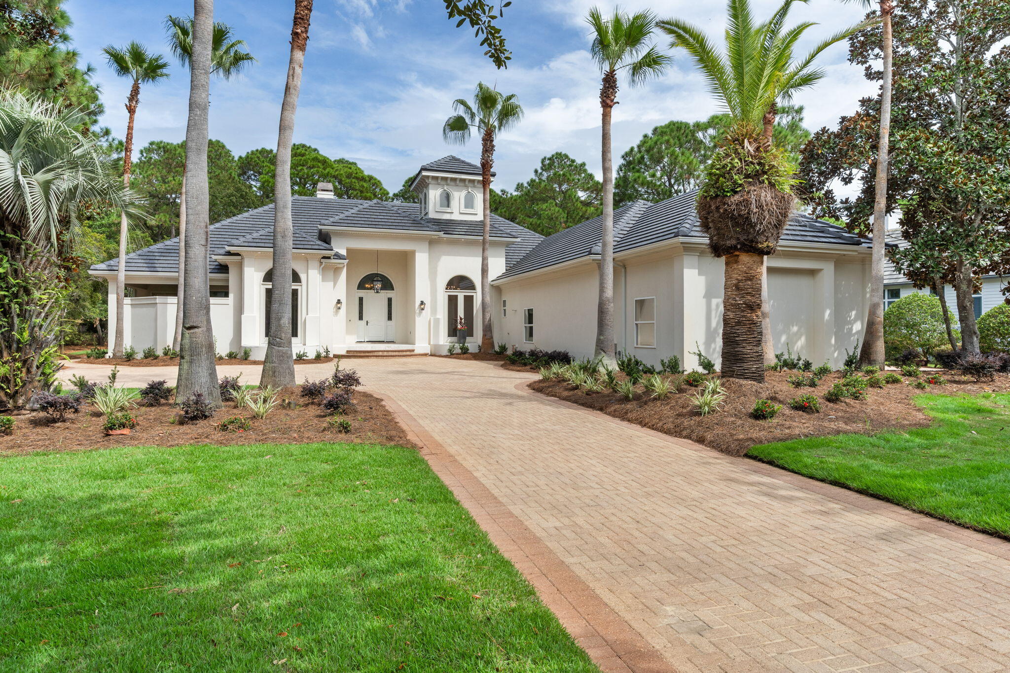 Welcome to 3104 Merion Drive, an extraordinary residence located in the exclusive Burnt Pine community within Sandestin Golf & Beach Resort. This elegant four-bedroom, four-and-a-half-bath home offers over 4,100 square feet of refined living space and an exceptional outdoor retreat overlooking the 8th fairway of the Burnt Pine Golf Course. Designed for both comfort and sophistication, this home embodies the essence of coastal luxury living along Florida's Emerald Coast.

Step through the grand entryway into a light-filled interior where high ceilings, crown molding, and custom millwork create a timeless atmosphere. The open-concept layout seamlessly connects the main living areas, providing an effortless flow for entertaining and everyday living. The formal dining room and spacious living room feature large windows that frame golf course views, while the chef's kitchen is a culinary masterpiece equipped with premium appliances, a gas cooktop, double ovens, custom cabinetry, and an expansive center island. A cozy breakfast nook and adjoining family room provide the perfect gathering spaces for family and guests.

The primary suite serves as a true retreat, offering a private sitting area, dual walk-in closets, and a luxurious en suite bath with double vanities, a soaking tub, and a walk-through shower. Each of the three guest bedrooms includes its own full bathroom, ensuring comfort and privacy for visitors. Additional features include a dedicated office, ideal for remote work or study, and a versatile bonus/media room that can be tailored to your lifestyle.

Outdoor living is at the heart of this property. The screened lanai extends the home's living space and offers a serene setting for relaxation or entertaining. Enjoy a resort-style pool and spa, a fully equipped outdoor kitchen. The expansive patio is surrounded by lush landscaping, providing a tranquil sense of privacy while capturing scenic views of the golf course.

A three-car garage and large driveway offer ample parking and storage, while meticulous attention to detail is evident throughout the propertyfrom the architectural craftsmanship to the beautifully maintained grounds. Situated on a generous 0.72-acre lot, the home provides an ideal balance of space, privacy, and connection to the outdoors.

Living in Burnt Pine at Sandestin means access to one of the Gulf Coast's most prestigious resort communities. Residents enjoy a world-class lifestyle with exclusive amenities including four championship golf courses, a private beach club on the Gulf of Mexico, tennis and pickleball courts, a full-service marina, and a state-of-the-art fitness center. The vibrant Village of Baytowne Wharf and Grand Boulevard offer fine dining, boutique shopping, entertainment, and year-round eventsall just minutes from your doorstep.
