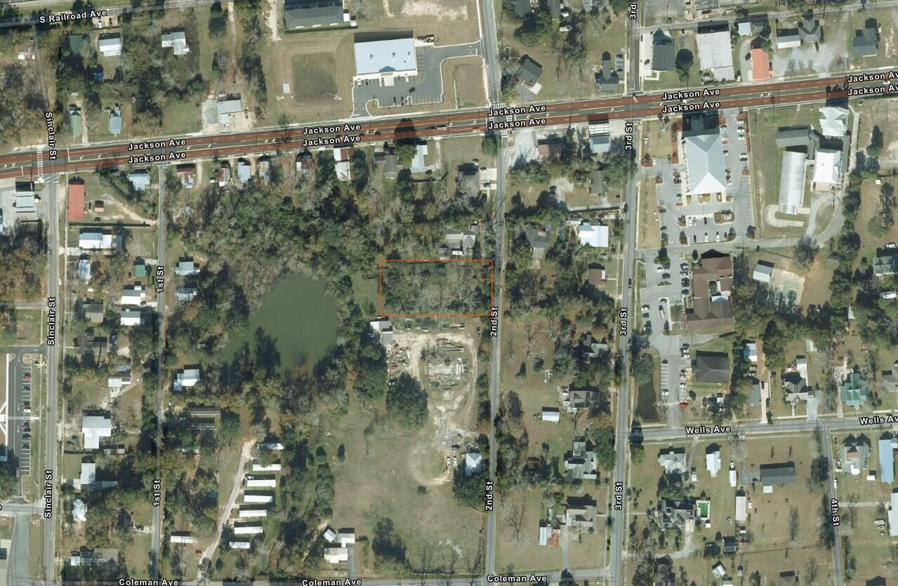 .53 Acre interior lot in the heart of downtown Chipley. Lot backs up to a lake providing priceless serene view as you start your day to winding down into the evening as the sun sets. According to GIS map, No wetlands on the property, x flood zone , see photos for all pertinent information . SURVEY is being done and will be available. More photos and drone footage to come