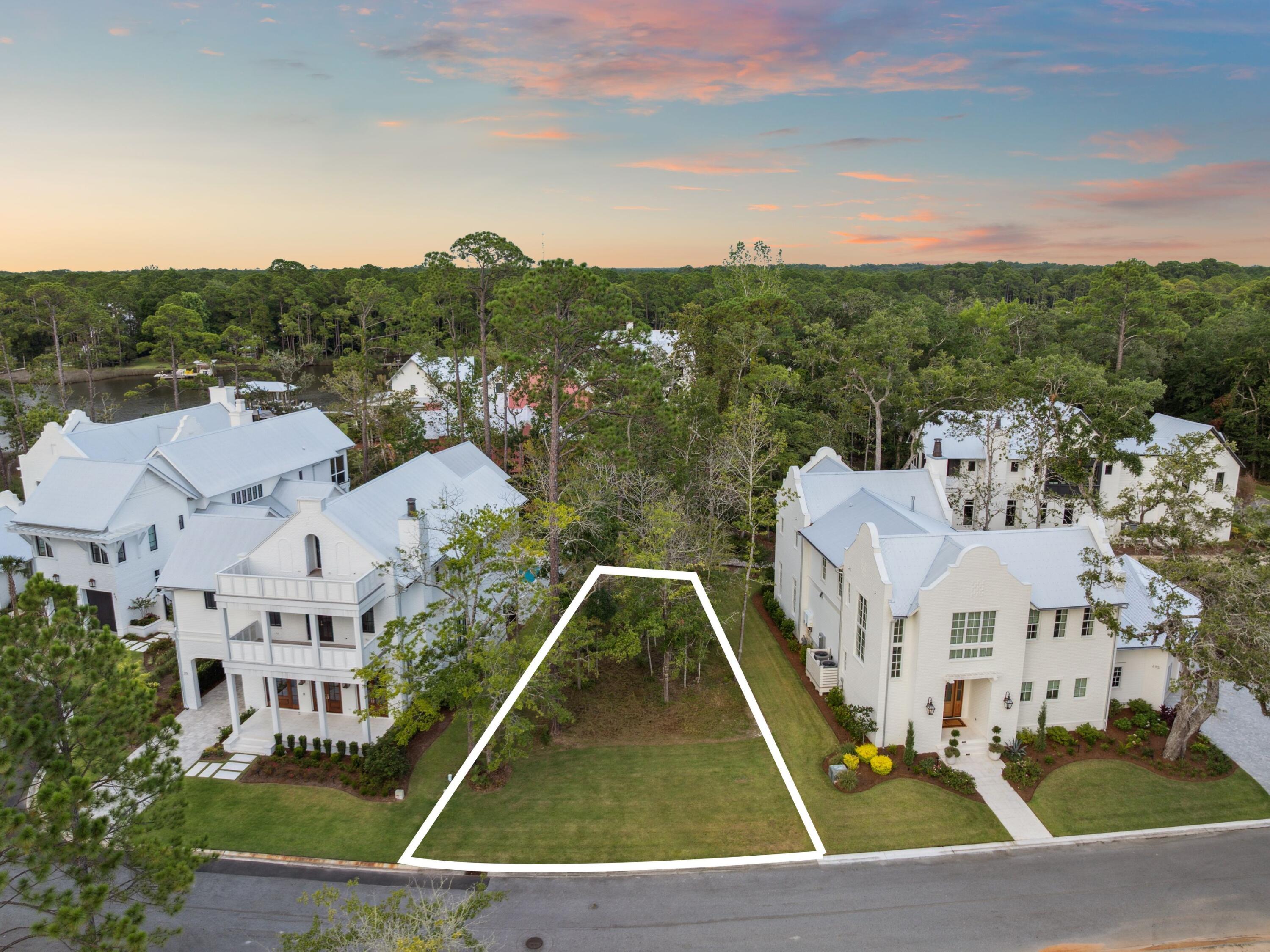 Situated near the heart of the Churchill Oaks community, Lot 82 offers a rare opportunity to build your custom home just steps from the neighborhood's premier amenities. This spacious homesite backs up to the scenic boardwalk that wraps around the neighborhood, offering peaceful views and easy access to nature right from your backyard. Located just a short stroll from the clubhouse, Lot 82 is ideally positioned for enjoying everything Churchill Oaks has to offer. The clubhouse features a resort-style pool, a state-of-the-art fitness center, and walking trails that meander through lush, landscaped grounds. Residents also enjoy access to a deep-water marina with private boat slips, paddleboard storage, and a fish cleaning station.

With its boardwalk setting and close proximity to the community hub, Lot 82 is a prime opportunity to create your ideal coastal retreat in one of Santa Rosa Beach's most prestigious neighborhoods.