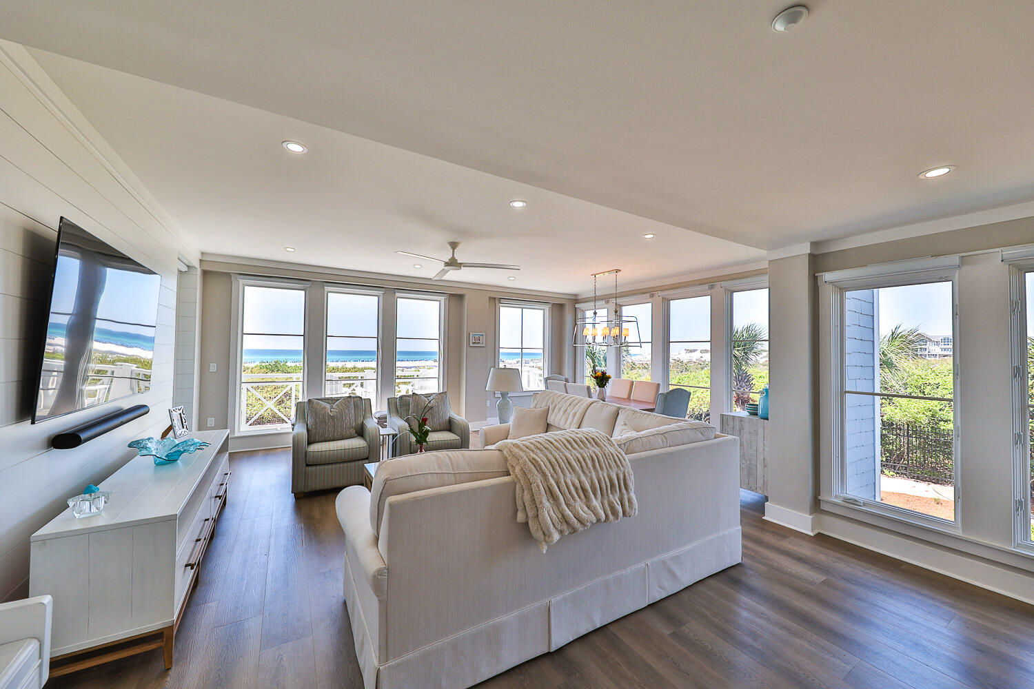 The most sought-after unit in Watersound Crossings is now available and offers an unparalleled experience for the most discerning buyer. Completely gutted and meticulously renovated from 2020-2022, this gulf-front, two-story 2631 sq ft unit is the only four-bedroom, four-and-a-half-bath residence situated in the westernmost corner in crossings. Boasting unobstructed gulf views from 35' wide balconies and breathtaking year-round sunsets overlooking pristine dunes. Enjoyed as a true second home, the residence is custom furnished and conveys as seen with few sentimental exclusions. Itemized list of remodeling highlights is in the documents tab, which include Wolf/Sub-Zero appliances, custom cabinetry, quartz countertops, LVP throughout and automized Hunter Douglas Silhouettes on all windows. This is the closest unit to the ever-popular Watersound Beach Club with gated access to the private property, only a few steps from the front door. Of the many features in this residence, the convenience of having an attached garage is not understated. This parking feature is not available in all of the units located in Watersound Crossings, adding tremendous value. Gary Coram of Coastline Custom Homes completed the remodeling. Additional features include new bathrooms, toilets, and tiled showers in all four bathrooms, which are en suite. Additional lighting was added to the entire downstairs level. A custom bar area was built with an ice maker and a beverage refrigerator, conveniently located off the chef's kitchen. A Sonos sound system was installed in the main living area and on the upstairs balcony. The Blink camera system was also installed during the renovation process. Custom storage units were added to the garage to enhance storage space for owners. The unit includes Wi-Fi-controlled thermostats for the HVAC units and a Wi-Fi-controlled garage door. The water heater was replaced in March of 2025. The $90,000 assessment for Crossings has been paid in full by the seller, and unit C (see documents tab) is to be completed in the Fall of 2025(approximate time).