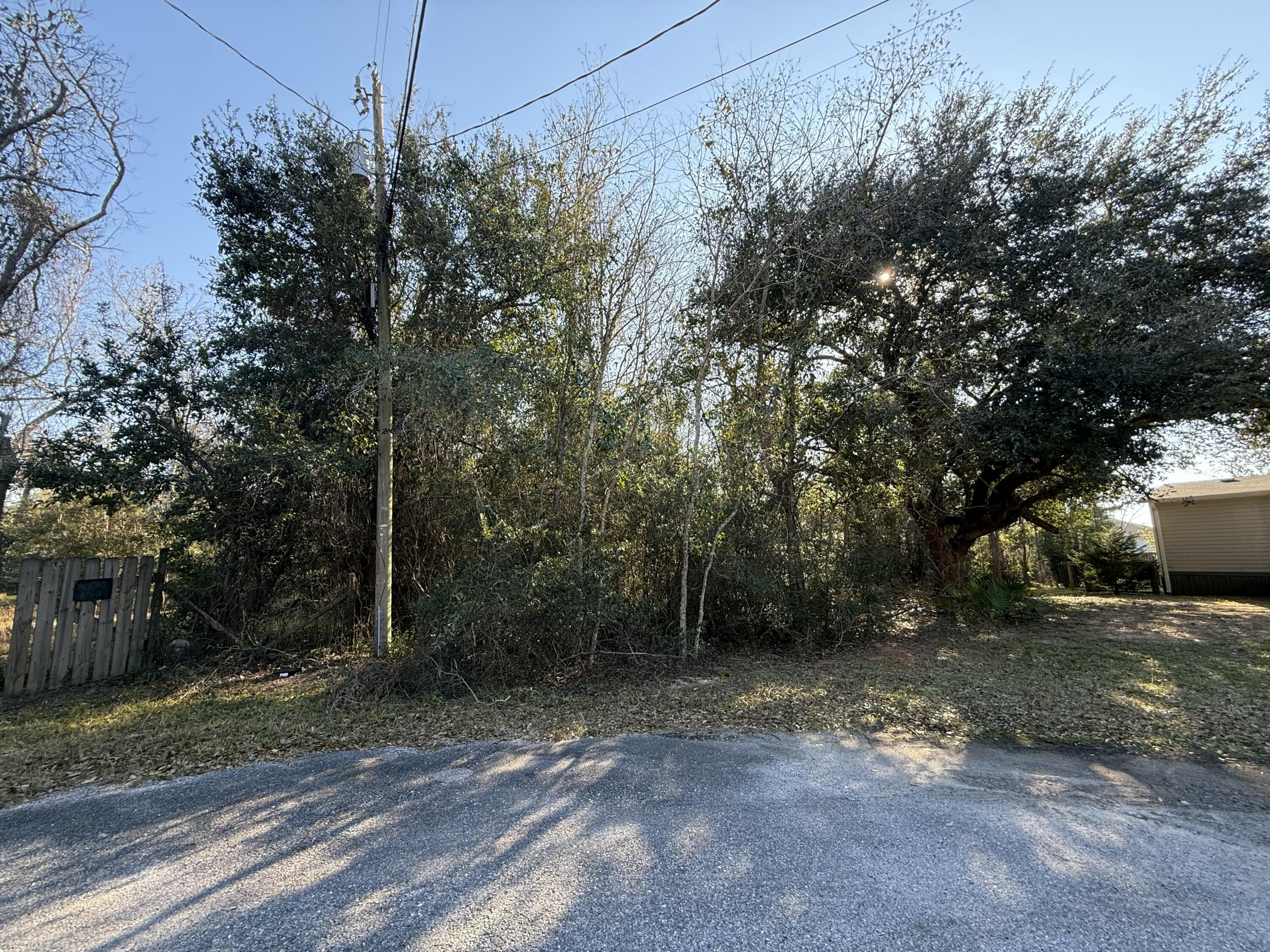 Own 0.61 acres in beautiful Gulf Breeze and bring your vision to life. This spacious parcel offers endless possibilities; perfect for building a custom coastal retreat, creating an investment property, or holding for future growth in a highly desirable area. Enjoy the ideal blend of privacy and convenience, located less than four miles from public beach access, with quick trips to sugar-white sands, emerald waters, and stunning sunsets. A rare opportunity to secure your own piece of paradise.

Back on market to no fault of the seller!

-Public Water & Electric are available

*Buyer to verify all measurements
*Property is 0.61 per Santa Rosa County