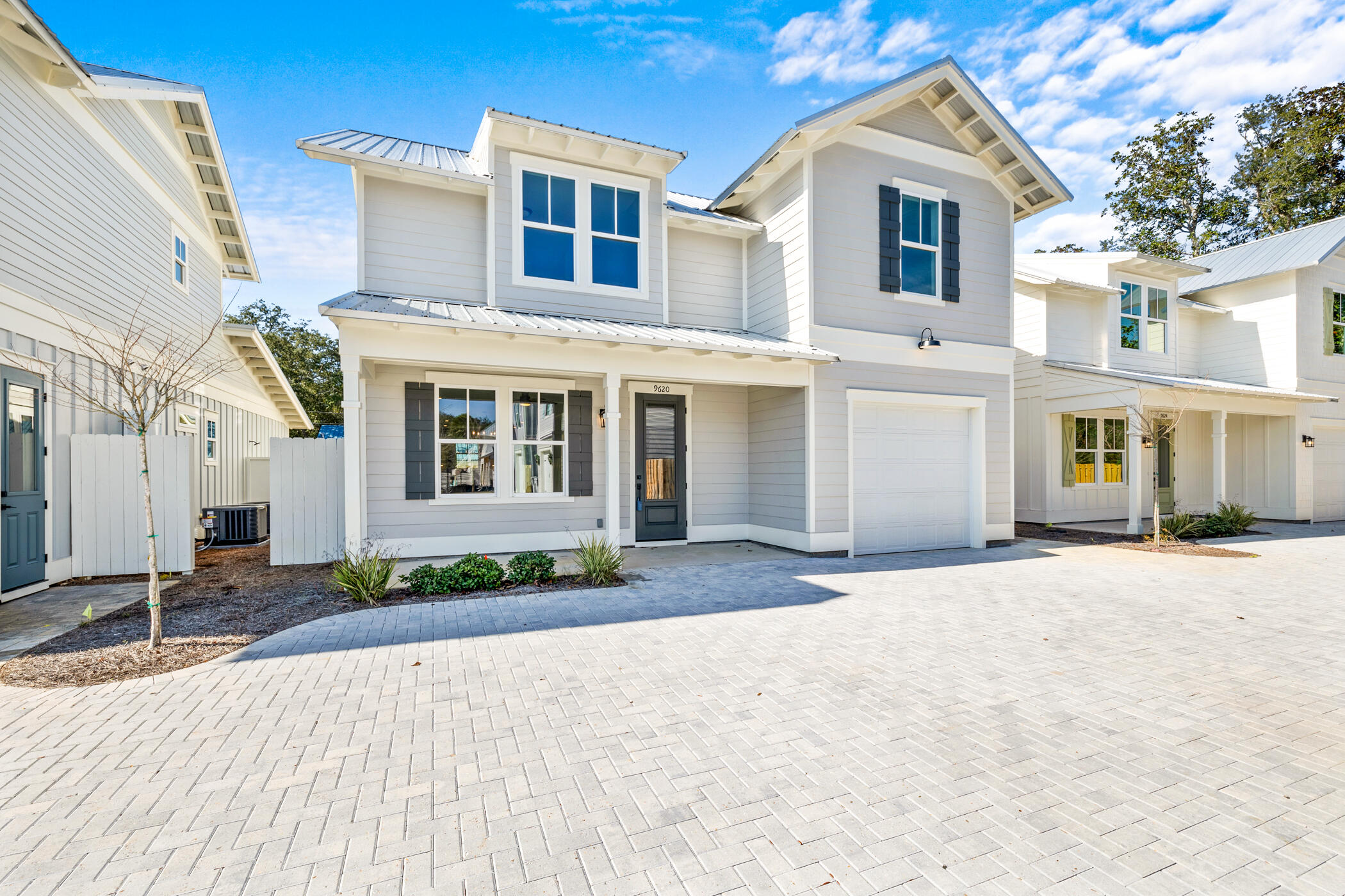 Completed construction with Seller Financing available with competitive terms!! Welcome to your dream oasis, where every day feels like a vacation with everything you need right in this area. Nestled in an exclusive, newly developed waterfront community, this 4-bedroom, 4.5-bath home (with bonus area) offers the perfect blend of luxury, tranquility, and modern convenience. Imagine waking up to serene water views from your 1st floor primary suite, enjoying your morning coffee while watching the gentle ripples of the Santa Rosa Sound, and stepping out onto the community dock to hop on your boat for a quick cruise or sunset sail. With 9 private slips just steps from your door, boating enthusiasts will find paradise at their fingertips. This is more than just a home, it's a lifestyle. Spend your days lounging by the water, walking along our pristine beaches just minutes away, or exploring all Navarre's growth has to offer. Live where others dream of vacationing, an angler's paradise, water sports haven, and a sun lovers' refuge. Welcome to your forever home, where the sky meets the sea and every day is an opportunity to indulge in the ultimate coastal lifestyle alongside your modern everyday needs. Prices, plans, features and options are subject to change. (New homes feature a single sink in upstairs bath just off bonus area). Square footage is approximate. Artist renderings, photos, colors, features and sizes are for illustration purposes only and may vary from the homes as built.