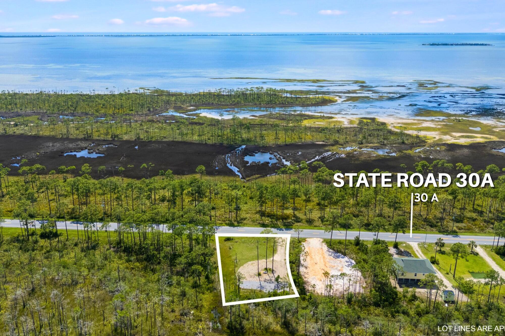 Turnkey RV Lot or Build Site with Bay Views - High-Demand Coastal Location! Here's your chance to own a cleared, half-acre RV-approved lot with beautiful views of St. Joseph Bay and Simmons Bayou. Surrounded on three sides by a protected nature preserve, this property offers lasting privacy and protected views. With water and sewer taps paid and installed, it's fully site-ready—just bring your RV or building plans. Located just minutes from Port St. Joe, Cape San Blas, and Salinas Park, this prime parcel is ideal for a custom home, full-time RV living, or an income-producing vacation rental. Enjoy convenient access to the community boat ramp, Presnell's Bayside RV Resort, St. Joseph Bay Golf Club, and miles of paved nature trails. Highlights: Bay views and spectacular sunsets - Cleared and ready to build - Utilities installed (water and sewer) - RV-approved (not in a restricted zone) - Minutes from beaches, golf, and boating Whether you're ready to build your coastal dream home or secure a flexible RV-friendly site in a high-demand area, this property offers unbeatable value on Florida's Forgotten Coast.