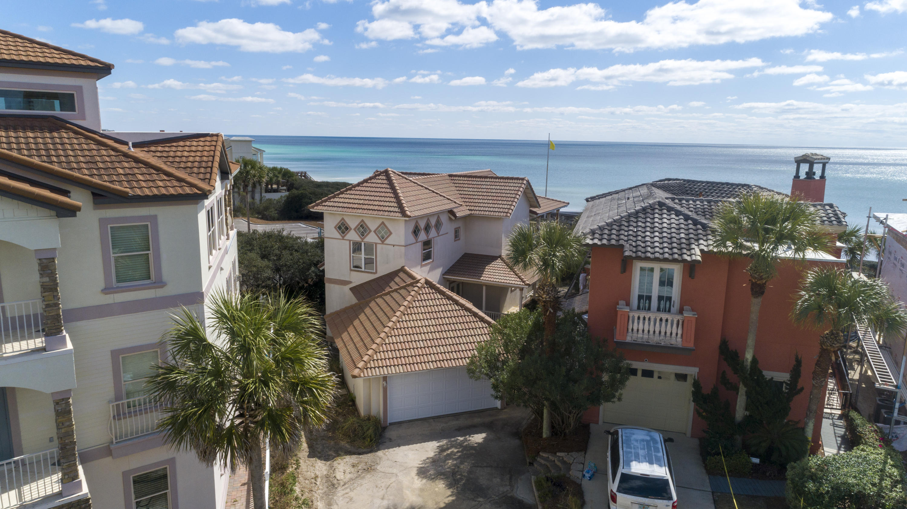 Attention Builders, Beach Lover's & Investors: Prime rehab or building site opportunity located directly on the beach and perfectly positioned on a 25 foot bluff overlooking a plethora of fine gulf villas and outskirt views of Destin & Panama City Beach. Tucked away in the highly desirable community of Seagrove Beach off of 30A, this is a must-see. This highly sought after location is one of the best opportunities on 30A with an exceptional layout to conclude a fabulous finished product as it boasts over half an acre, 55 feet of linear beach frontage and underground utilities. The east side of the property abuts the public beach access allowing for expansive and unobstructed gulf views to the east in addition to the immediate frontage. This exceptional site boasts three bedrooms, three baths and over 1,200 feet of generous outdoor living space.  The Mediterranean tiled roof, H-Vac systems and kitchen appliances were all replaced in 2018.

Seawalk Circle is located south of 30A in a cul-de-sac consisting of 12 residences, some of which are full time. An exceptional proximity to Seaside, Watercolor & Aly's Beach with quick access to world class shopping, dining & local entertainment., this "As-is" residence is a white canvas, offering a ton of possibilities.

*Buyer is responsible for personally verifying details about this property. Any information contained in the listing is believed to be accurate, but not guaranteed. **