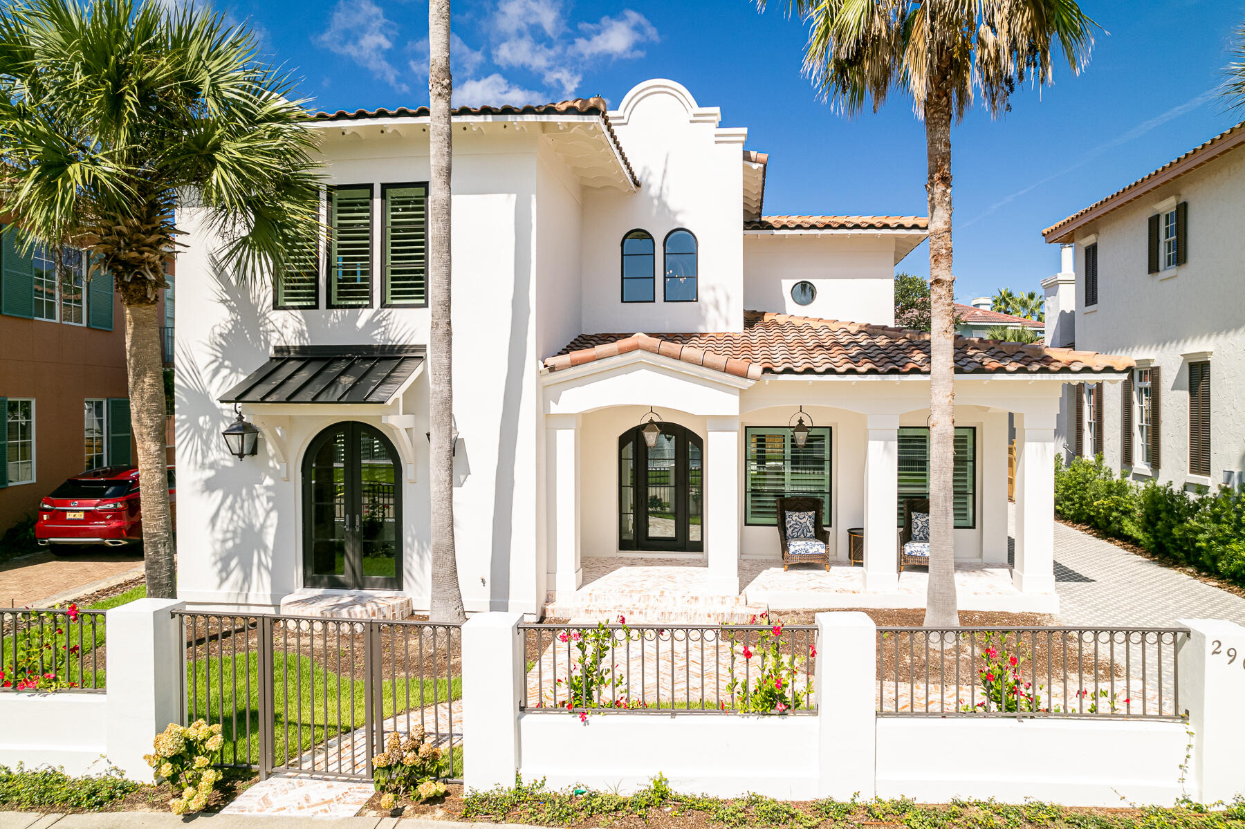 Ultra-luxe renovation/expansion just steps from the private beaches of Caribe. No expense was spared in fully updating this 4 bedroom, 4 and a half bathroom modern Caribbean style home where interior details include whimsical tile, built-ins galore, stunning architecture, and edgy custom lighting. Every surface was improved, beginning with a brand-new roof, and impact rated windows and doors. A tour of this home will leave you wondering, 'how did they think of that?'  

Custom-patterned pavers lead to a deep front porch overlooking sparkling lake views. A newly constructed private garage is wide enough for parking, beach toys, and your own golf cart. It even boasts its own commercial-sized ice-maker and custom cabinetry. 

The open-concept main level offers simply breathtaking detail from every angle: 10 ft ceilings, custom metal railings, high-end tile and fixtures, and designer furnishings. An exquisite chefs kitchen boasts an extra-large island and top-of-the-line appliances, complete with a custom-paneled refrigerator, ice maker, and La Cornue range. 

The main floor master suite offers a private respite with a built-in workspace, separate vanity area, large bathroom with a rain head shower and soaking tub, and custom walk-in closet. An additional master suite is located upstairs, and includes its own built-in vanity, plus a mini-fridge and coffee station. Two additional spacious bedrooms can be found upstairs, all generously and luxuriously appointed with unique detail, and all with private baths. 296 Rue Caribe is being offered fully-furnished with a few exceptions.

Caribe is a guard gated, private gulf front neighborhood conveniently located near Grand Boulevard in South Walton County. Caribe's private beaches offer daily chair service and endless sunsets. Two neighborhood pools, tennis courts, lush landscaping, Caribbean style architecture and friendly neighbors are included in low HOA fees. Caribe neighborhood allows vacation rentals with limitations on occupancy. It offers the best of both worlds, quiet privacy and opportunity for rental revenue. While only about 25% of the homes are on the vacation rental market, the opportunity to realize income is an added bonus. Make an appointment to see this well-appointed home today. Consider Caribe as your next destination.