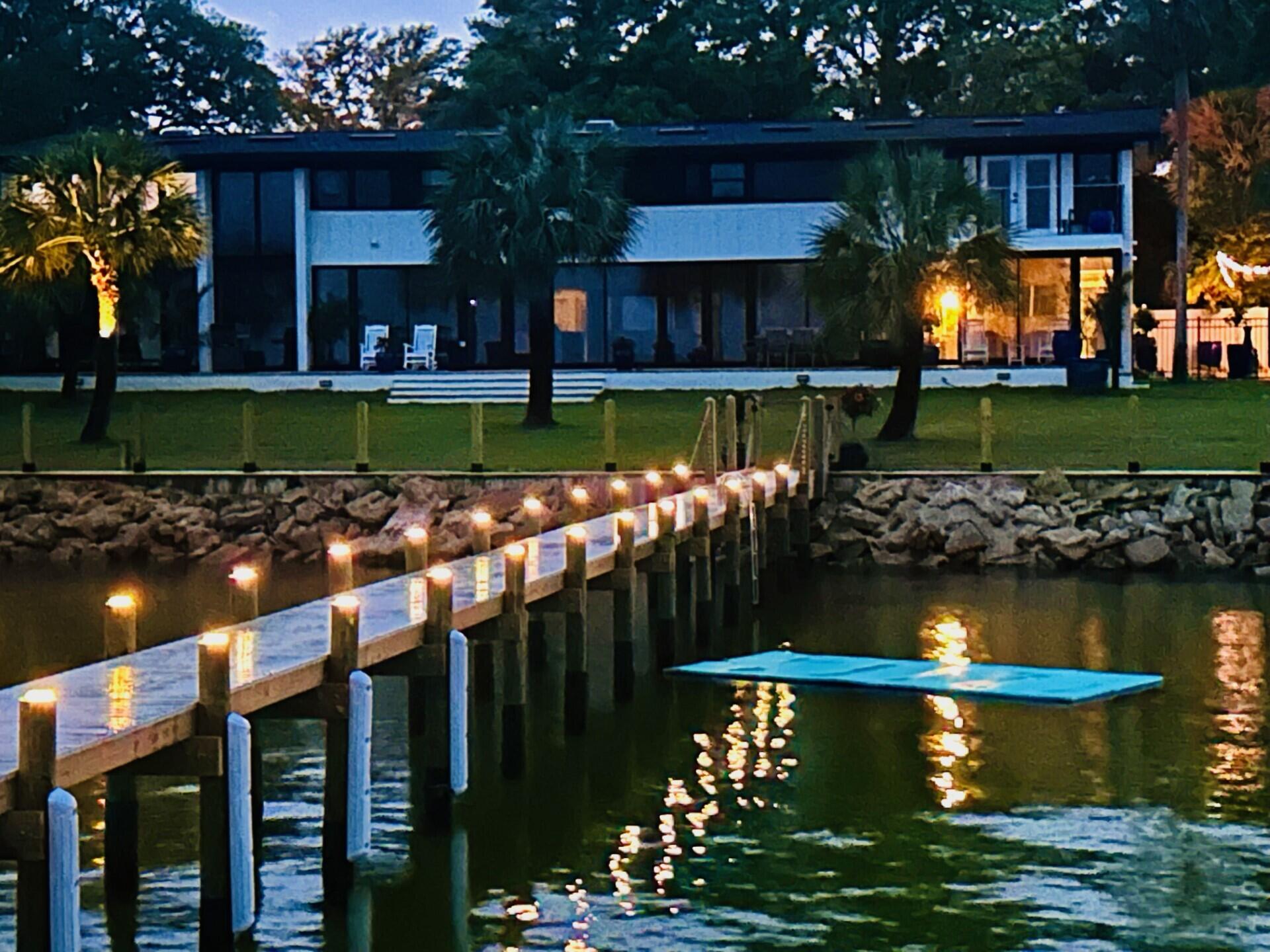 Beautifully renovated and turn key estate in sought after yacht club neighborhood. 4 bed 4 bath, 4137 square ft; with an additional ~1200 sq indoor pool area/ workout room.  Large lot with expansive front and backyard creating a very private feeling. 150' water frontage that includes new wear deck dock with expanded sitting areas; fish and crab from your own backyard. The home is nearly 90ft long with tall expansive windows which creates views from just about every room in the home including even the laundry room.  The water behind the home is about as good as it gets being able to swim and wade out hundreds of feet. 5 min boat ride to crab island and local beaches.  Exceptional morning sunrises, views across the bay to Destin including Destin's weekly fireworks.  Sip on your morning. coffee from your second story private master suite patio. Walk down the street to the yacht club for a cocktail or dinner.  Beautiful koi pond with waterfall and seating for another great location to relax.  Listen to the waterfall while laying in bed from the master window.  Pick fruit and berries throughout the property with a gorgeous mature landscape. This home has it all.