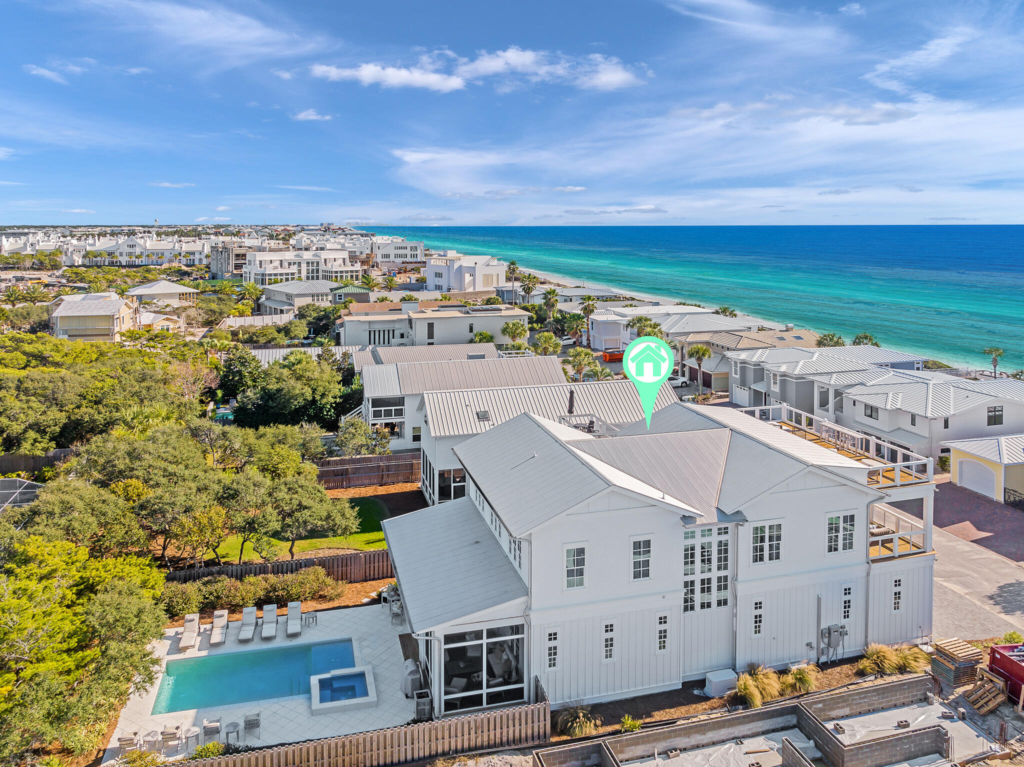 This fabulous home truly does check all the boxes.  Located one tier off the Gulf in the gated. non-rental neighborhood of Sand Cliffs, the home offers breathtaking forever views of the gulf as well as convenient beach access to over 1,200 feet of pristine, quiet beach.  Designed by architect Geoff Chick, the floorplan boasts spacious rooms and oversized outdoor living. No detail was spared in the professionally appointed decor with new high-end furnishings, rugs, original art and custom window treatments.  This exquisite home is offered fully furnished and move in ready.  

Walk or bike to Alys, Rosemary, Kaiya and Camp Creek Club for all the activities and dining you enjoy but return home to a private secluded oasis and feel miles away from the action.  The ultra-private backyard features a heated pool/spa, screened porch, outdoor shower and enough space for that July 4th barbeque.   

The entrance loggia creates a sense of calm with its water feature and establishes privacy to the home.  The generous foyer presents a spacious feel that continues throughout.  Three ensuite bedrooms with king sized beds are located downstairs.  

The second-floor chef's kitchen offers Blum Legra box drawer cabinetry, Sub Zero and Wolf appliances, an oversized island, walk in pantry and quartzite countertops.  The open kitchen, dining and family room flow to the second-floor porch with stunning gulf views and breezes.   From here head to the third-floor viewing deck for sunset views that will render you lazy.

Tucked away on the second level also discover the primary suite with all the bells and whistles. The bath offers a separate soaking tub and shower, marble finishes and double vanity.  The generous cabinetry in the primary closet is designed for full time living and conveniently connects to the laundry space.

Additionally, two oversized climate-controlled garages offer epoxy granite flooring, additional fridge and freezer, and tons of storage for any beach board or toy you desire. A whole home generator and irrigation system keep things running smoothly. This home has been impeccably maintained.