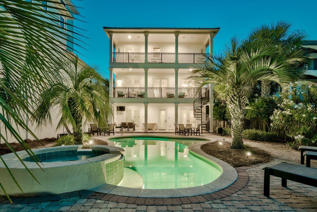 Experience this stunning resort-style rental machine ideally located near exclusive gated beach access within the heart of Frangista Beach. 52 Miami Street is 3,816 sq ft, complete with seven bedrooms, four full baths and one half bath. This property is a rental magnate with over $250,000+ in projected annual income and a solid rental history. Notable features include a private elevator accessible to all floors, two car garage, large lagoon style pool with tiki bar and adjoining summer kitchen, multiple master suites, gulf views from the second and third floors as well as ample living space perfectly functioned for entertaining. The layout is extremely open with living spaces outlined on each level of this three story home. The kitchen and living room are ideally located on the second level and feature beautiful granite countertops, gas cooktop, breakfast bar for additional seating, stainless steel appliances as well as a wood look porcelain tile floor that is carried throughout the main living areas. The living room opens to a spacious wrap around balcony that spans the entire width of the home and features convenient spiral staircase access to the rear deck. The third floor master suite is extremely private and features a gulf view, private balcony as well as a large on-suite master bathroom complete with travertine accents and dual vanities. This home is an excellent rental property or second home with close proximity to beach access, walking distance to the beach and to numerous world class restaurants, shopping, Whole Foods and ability to easily jump on Scenic 98 for a bike ride or morning walk.