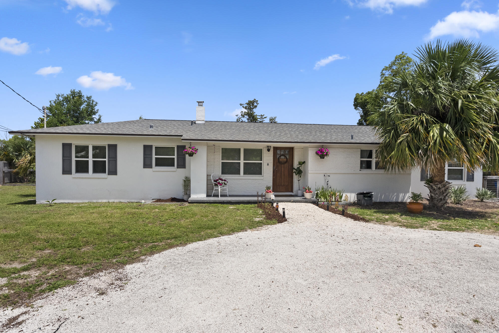 Updated. Priced right. Move-in ready in the Cove. This 4 bedroom, 2 bath home offers 1,707 square feet of clean, functional space in one of Panama City's most desirable neighborhoods.

You are minutes from downtown, local shops, great restaurants and the waterfront. The location alone gives this home real value.

Inside, the upgrades stand out. New flooring, white quartz countertops, stainless steel appliances, custom cabinetry and fresh craftsman-style trim. Major systems are already handled with updated plumbing and electrical.

The oversized backyard gives you room to relax, entertain or add future features. The extra-wide driveway fits multiple vehicles, a boat or an RV without hassle.

St. Andrews Bay Yacht Club and public boat access are right around the corner. Golf cart  living is part of the lifestyle here.

Strong updates, a prime neighborhood and a price that makes sense. This is the Cove opportunity buyers wait for. Come see it.