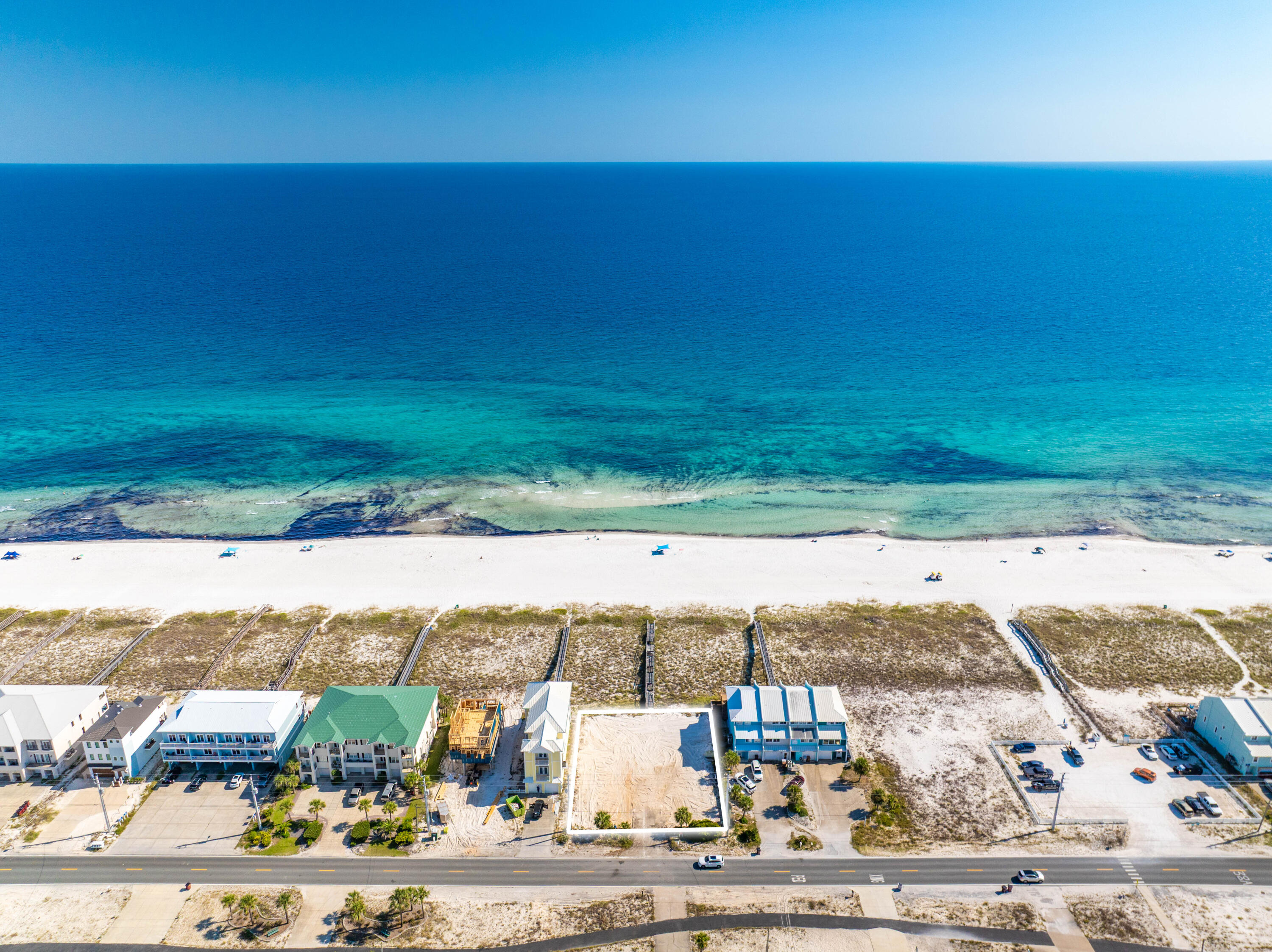 UNIQUELY RARE MULTI-FAMILY CLEARED LOT WITH 100 FT OF GULF FRONTAGE! Freshly cleared at the seller's expense, this prime parcel presents a true blank canvas along Florida's coveted Emerald Coast. With flexible development potential, the site can accommodate up to 12 condominium units, 4 townhomes, 2 spacious residences, or one extraordinary estate commanding the full 100 feet of frontage. Opportunities of this caliber are seldom available—don't let this visionary investment pass you by.
