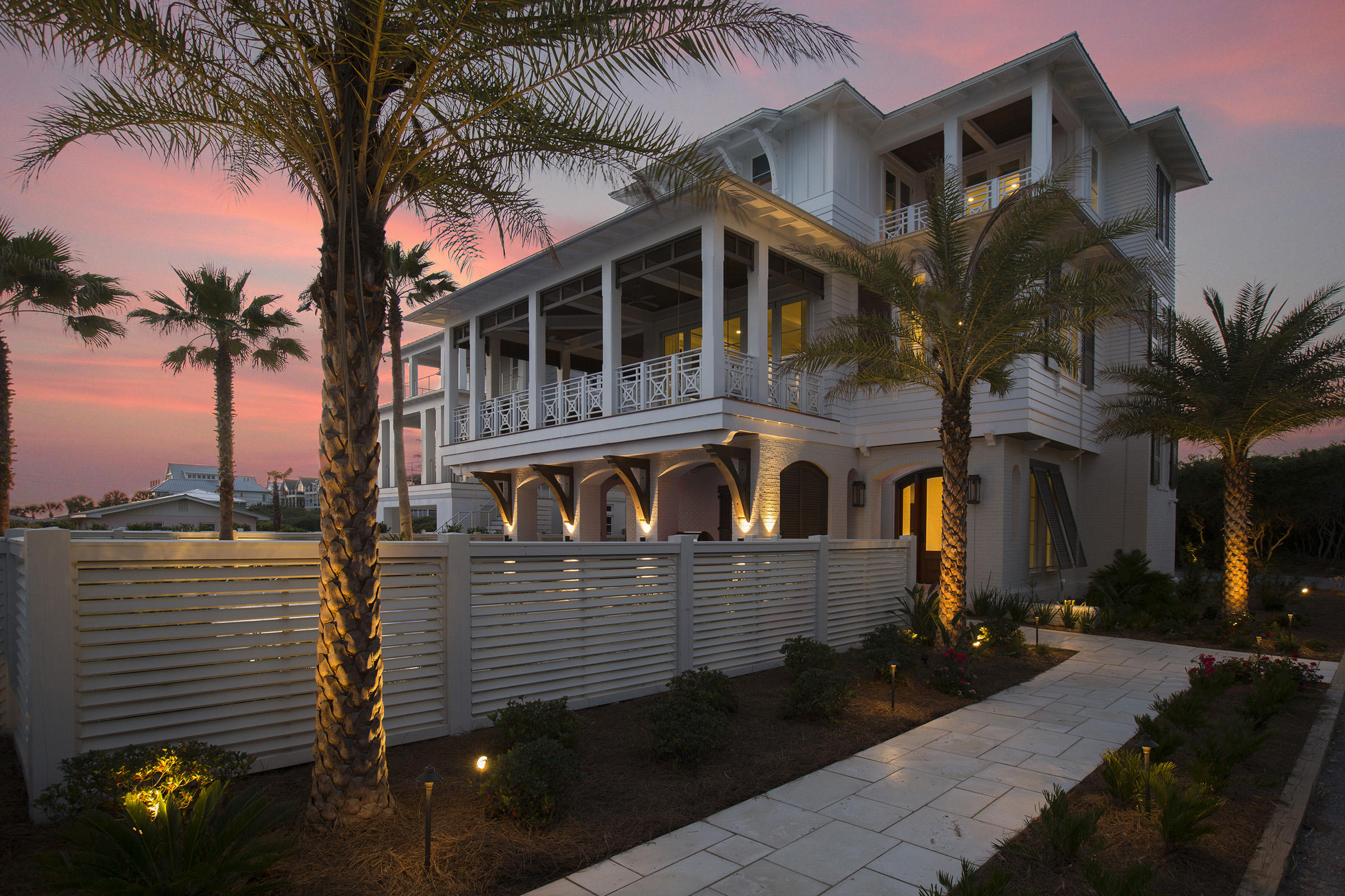 Located in a four-home enclave in the heart of Inlet Beach, 292 Pompano sits only one row back from the beach and was built with intention and elegance by a team of architects and designers. The interior and exterior designs reflect this, with beautiful and innovative designs combining the stunning Gulf views with the height of luxury living. 

292 Pompano initially greets you with beautiful stone walkways and white privacy fences; and invites you in with a handsome arched mahogany door and a mosaic-tiled water feature. An inviting salt-water pool, complete with a sunbathing tier, captures maximum sunlight and is heated for night and wintertime enjoyment. 

The main living area, located on the second floor, will absolutely stun you with the expansive views of the emerald Gulf waters. The 9-foot folding Euro-wall, located along the front and western sides, opens to an ultra-spacious wrap-around deck, allowing the living room and deck to become a singular space overlooking the Gulf. The second floor also includes a separate dining room, with enough seating for 10, and a gourmet kitchen stocked with cutting-edge Thermador appliances, custom cabinets, U-Line refrigerator drawers, sea pearl quartzite on the counters and an 8-foot-long island. The kitchen also features a built-in banquette and a custom-made sideboard, an elegant disguise for an icemaker and two more refrigerator drawers. Balconies off the second- and third-floor bedrooms and library offer even more opportunities to enjoy the outdoors and Gulf views.

Enjoy the five bedrooms and eight bathrooms, which provide ample space to enjoy with friends and family. Three master suites, one on the second floor and two more on the third floor, provide a welcome oasis for adults. The master suites feature stunning bathrooms with marble floors, European showers, and soaking tubs. Downstairs, two more bunkrooms give kids their own space with TV's and fun electronics. 

This home is offered fully furnished with items selected by one of the area's top design firms. Additional spectacular features include a regulation-size bocce ball court and an outdoor pool half-bath, 4 separate Sonos zones with streaming music for the entire house, a fully integrated security system, an oversized gas fireplace in the living room, exterior lighting for aesthetics and security, and gorgeous landscaping. 292 Pompano is stunning, one-of-a-kind and close to all the action and fun on 30a.