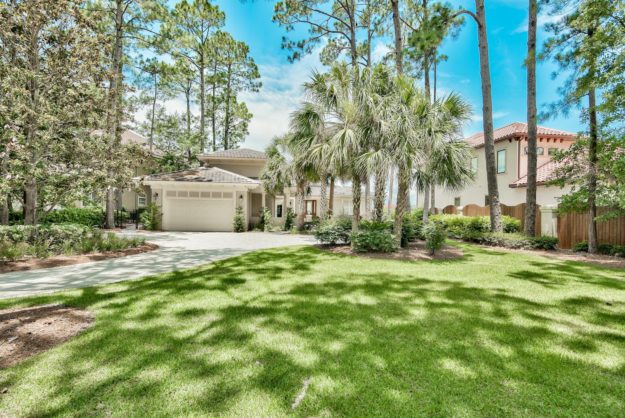 Lush landscaping welcomes you to this lavish Bayfront home in Bay Villas. You are first greeted with a privacy gate into the stunning courtyard with separate access to guest accommodations. The entrance and foyer area of this unique home provides for a welcoming experience and feel with its high ceilings. Convenient electric curtain controls present you with the awesome west facing bay views of the Choctawhatchee Bay and the formal living area with fireplace boasts high ceilings with floor-to-ceiling windows bringing in the natural light from above. The adjacent dining room with wet bar leads to an open kitchen and informal living room with access to the front courtyard. The kitchen offers light and storage space and with a convenient work island. The master bedroom has his and hers custom designed, walk-in closets. The master bath has dual vanities and a shower with separate tub. For those looking to entertain, this home offers a separate entry from the courtyard to the guest suite for privacy and convenience. The versatile 2nd floor space, complete with kitchenette, is being used as a bunk room but can also be utilized as a media room or an office. The abundant upgrades include a sound system throughout, a security system, custom wall coverings and curtains, a custom outdoor area with a pool, hot tub, and dock, and a two-car garage. Gas is also available as an option. Enjoy your days and evenings relaxing under the covered patio areas that descend to the pool, hot tub, and rich green space.

As an introduction to the Sandestin lifestyle, we invite our new owners to explore amenities that make Sandestin special. The listing brokerage and seller(s) are presenting the buyer(s) of this property with (2) 90-minute rounds of Tennis court time, a golf foursome at one of our three championship courses, a round of golf for up to four (4) players and an invitation to "Club Night" at the unrivaled Burnt Pine Golf Club.

Sandestin Golf and Beach Resort is a major destination for all seasons and all ages, and has been named the #1 resort on Florida's Emerald Coast. This magical resort spanning over 2,000 acres is comprised of over 70 unique neighborhoods of condominiums, villas, town homes, and estates. The resort features miles of sandy white beaches and pristine bay front, four championship golf courses, a world-class tennis center with 15 courts, 4 resort swimming pools (and 15 private neighborhood pools), a 123-slip marina, a fully equipped and professionally staffed fitness center and spa, meeting spaces and The Village of Baytowne Wharf, a charming pedestrian village with events, shopping, dining, family entertainment and nightlife. For true golf cart community living, Grand Boulevard is just outside the resort gates and provides access to additional shopping, dining and entertainment, all without traveling on Hwy. 98. Come to Play, Stay for Life!