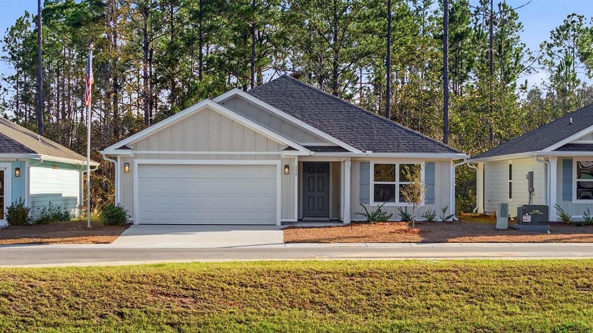Welcome to 155 Eunola Lane, a new home in Phase III at Ashton Park in Freeport, Florida. This home is ready for move in. Entering this home, you will find EVP through the foyer which opens to a bright and airy space, with two secondary bedrooms and a full bathroom tucked off to one side. These rooms are perfectly sized with each offering plenty of closet space and easy access to the shared bath. This home features a seamless living space with EVP and carpet in the bedrooms.  
Continuing into the heart of the home, you will find an open concept living area. Here, the kitchen is open to the living area and features granite countertops, stainless steel appliances, and an island with a breakfast bar that creates the perfect spot for casual dining or entertaining. The adjoining dining area is well-positioned for family meals, while the living room offers a comfortable space to relax, complete with views of the backyard. The laundry room is off the kitchen and is complete with extra storage shelves. Privately located at the back of the home, the primary bedroom offers a peaceful retreat. The large bedroom is complemented by an ensuite bathroom, featuring a dual vanity, a large shower, and an expansive closet designed for all your wardrobe needs.  

The patio at the back of the home provides the perfect place to enjoy outdoor living.