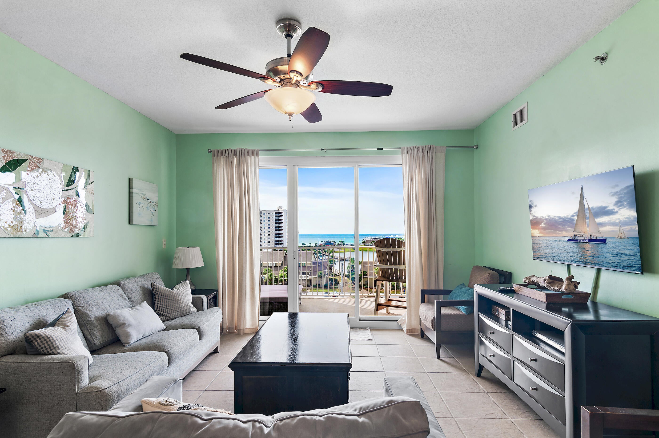 New HVAC in 2023! Experience elevated coastal living at 122 Seascape Blvd, Unit 608 -- a refined retreat within Ariel Dunes II at Seascape Beach Resort. This fully furnished 2-bedroom, 2-bath condo blends comfort with breathtaking views, offering the ideal escape for beach lovers. From the spacious private balcony, take in panoramic views of the Gulf, Stewart Lake and spectacular sunsets that paint the sky each evening. Inside, the open-concept layout is designed for both relaxation and entertaining, with stylish furnishings and a bright, inviting atmosphere. Ariel Dunes II provides resort style amenities, including three expansive pools, a state-of-the-art fitness center, the popular Cabana Café, and a large grilling area perfect for gatherings. Click ''more'' to continue. Owners and guests also enjoy full access to the unparalleled offerings of Seascape Resort with two additional pools, multiple tennis and pickleball courts, a golf course and deeded beach access. Whether you're seeking a primary residence, a refined second home, or a strong investment property, this condo places you at the heart of Miramar Beach's premier coastal destination.
