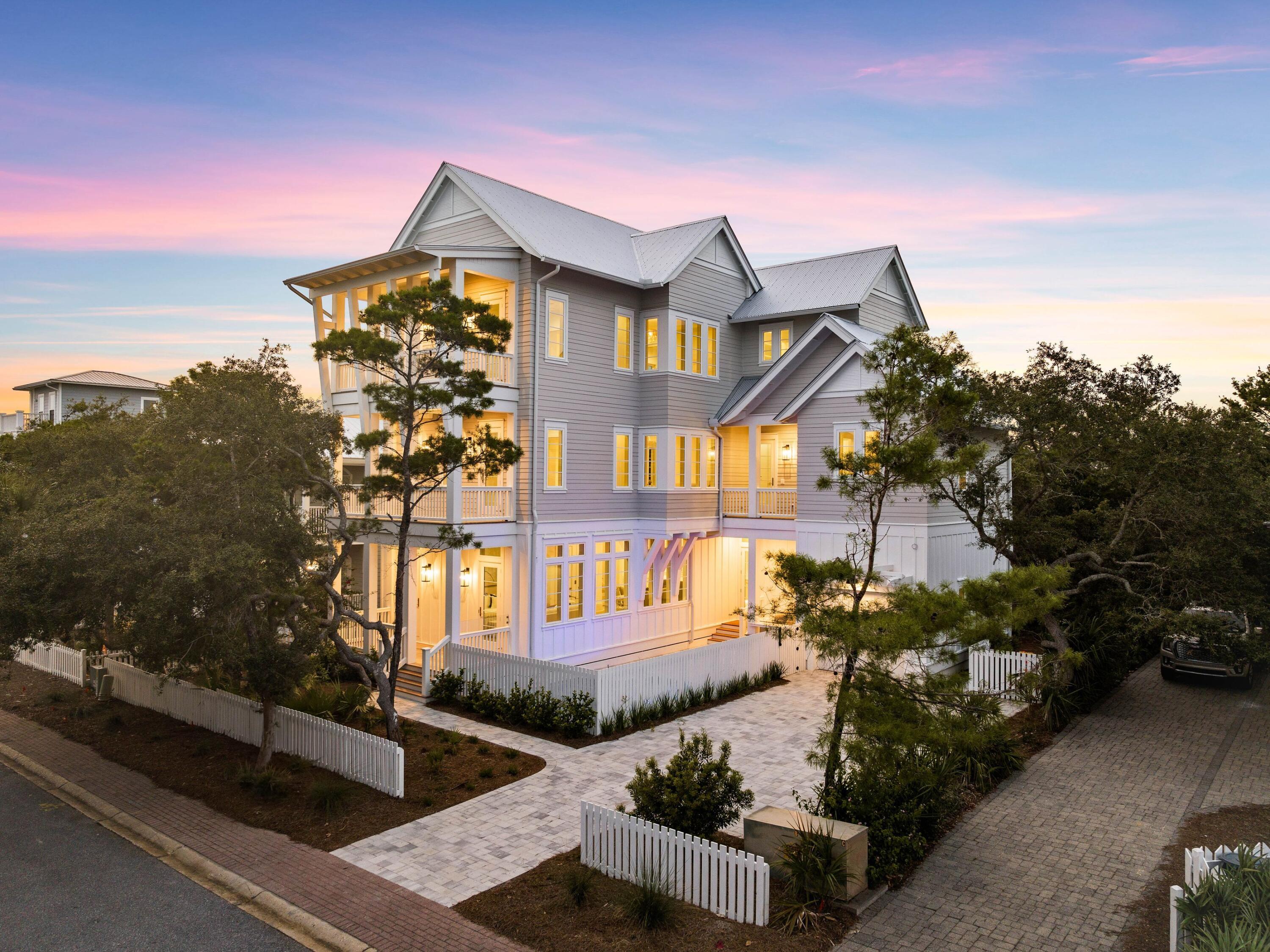 LOCATED IN GATED NEIGHBORHOOD WITH PRIVATE BEACH.  Don't miss this rare chance to own a brand-new coastal retreat in the esteemed beachfront enclave of Old Florida Beach. Completed in April 2024, this five-bedroom, six-bathroom masterpiece boasts gulf views and luxurious amenities, offering the epitome of coastal living. Nestled within a gated community, this residence affords unparalleled privacy and exclusivity, with three private beach walkovers and a community dock on Draper Lake just moments away. Enjoy the best of beach living with your own private pool and outdoor kitchen, perfect for entertaining or unwinding in style. Plus, the heated community pool is conveniently located nearby for added relaxation. Whether you're seeking a primary residence, a second home, or an investment property, this home offers endless possibilities. Each of the five bedrooms features its own bath, providing comfort and convenience for all guests. With central living areas on each floor, including spacious gathering spaces and breathtaking views, every corner of this home exudes luxury and comfort. Finished with high-end touches throughout, this home boasts all-new, neutral finishes, allowing the new owner to personalize the space with their own colors and décor. Sold unfurnished, this blank canvas awaits your personal touch to transform it into your dream coastal haven. Experience seaside serenity and unparalleled luxury in the coveted community of Old Florida Beach.