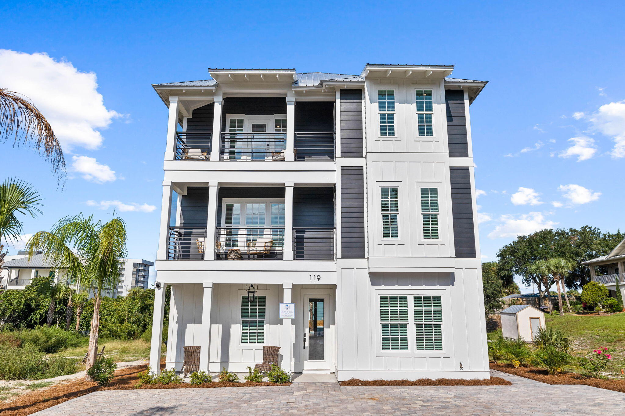 This 8-bedroom knockout home was just completed in September of 2023 and is going to be a RENTAL GIANT with over $335,000 in gross rental revenue projections for 2024!  This home will easily differentiate from others on the market when you see how it was professionally designed and loaded with high-end finishes throughout! No expense was spared and the highlight reel goes on for days featuring a Wolf Range, Liebherr Fridge/Freezer, panel-ready U-line Ice Maker and wet bar Fridge, Wolf Built-in Microwave, Asko panel-ready Dishwasher, Franke Fireclay sink, White Oak trimmed custom Venetian Plaster Hood, Brizo Plumbing Fixtures, custom White Oak Cabinets, Waterfall Quartz kitchen countertops, Shiplap living room walls, high-end chandeliers/pendant lights, Luxury Vinyl White Oak Flooring,... Dining Room Wet Bar, bathroom tile packages that rival any home in the area, 8 bedrooms, each with an ensuite full bathroom, a large open concept entertaining area on the first floor with a wrap-around kitchen island, quartz countertops throughout, a second floor entertaining/bunk area perfect for the kids, and a backyard entertaining area perfect for escaping the beach to enjoy the large private heated pool and spa! When you do your homework, this property will have to be at the top of the list, as it truly checks all the boxes and will set the bar for the others to look up to. Call today for more information or your private viewing of this stunning rental beast!