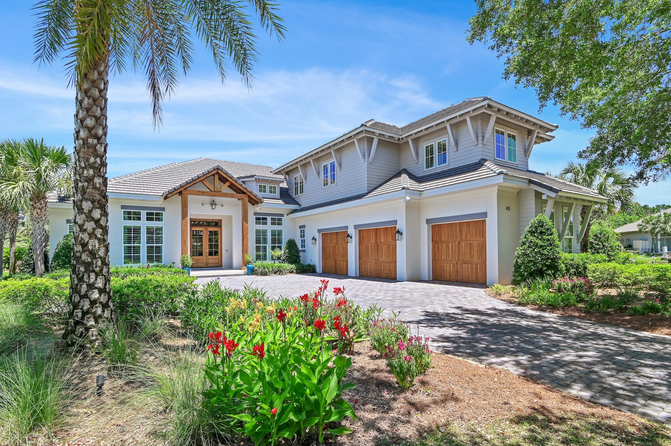 PRICE ADJUSTMENT! Exquisitely designed and meticulously maintained, this lakefront beauty from Destin Custom Home Builders is a jewel in the crown of the well-loved and highly admired Regatta Bay Golf and Yacht Club neighborhood. Supremely located on the most perfect lot, featuring 237 feet of wraparound lake water frontage. The home is nestled on a quiet cul-de-sac for the utmost in privacy. The masterful woodwork of the impressive front porch columns sets the tone for the artistry throughout. The main level flows from a large great room with fireplace, to a gourmet kitchen and formal dining room that are simply stunning. A main level primary bedroom and bath, office, and two additional guest suites comprise the first floor. The upper level comprises large den, and office space, a charming bonus room, and a fourth guest bedroom and full bath. 
The outdoor area features a stunning 15x30 heated pool and spa, screened lanai overlooking the lakefront, and the luxury outdoor kitchen and porch area of your dreams! With such reverence for high quality durable materials and expert craftmanship - with an emphasis on longevity and classic design - these features withstand the elements and remain in pristine condition. 
Incredible construction features such as impact resistant windows and doors, insulated garage doors, wind and impact rated garage doors, foam spray insulation in roof for superior energy efficiency, insulation in all interior walls for energy efficiency and sound proofing, and insulation between floors for sound barrier, this home is in the upper echelon of excellence when it comes to custom home building. All showers have Schluter waterproofing systems specifically designed to maintain integrity and durability. Smart home features throughout; high tech and highly secure. Air conditioning zones for maximum system efficiency and output. Custom wood shelving in all closets. Custom solid wood cabinets throughout. 
The upgrades and custom features in this home are what truly sets it apart, over $300,000 in seller upgrades, in addition to beautifully appointed and exquisite furnishings that are negotiable, with some seller exclusions. This home was professionally furnished and decorated and photographed for magazine publication. It's elegant coastal design is classic and understated. Quiet luxury has made its home here... 
The floor plan is so welcoming; perfect as a primary residence or second home; it affords both luxe-comfort and style and extends itself to entertaining effortlessly. Come and see this exquisite home, new to the market for the first time, with owners who have lovingly and meticulously maintained this home in better-than-new mint condition! 
Regatta Bay is supremely positioned on a lush 120-acre protected nature preserve fronting the Choctawhatchee Bay, boasts a central Destin location where everything you need is just a short golf cart ride away, including the stunning beaches of the Gulf of Mexico on the Emerald Coast. Regatta Bay showcases one of the most stunning golf courses in the country, it's par-72, 18-hole course is a golfer's paradise, and it remains a premier golf club on the Emerald Coast. Add to the 18-hole golf course, a private marina and unparalleled amenities, and life at Regatta Bay is near perfect.