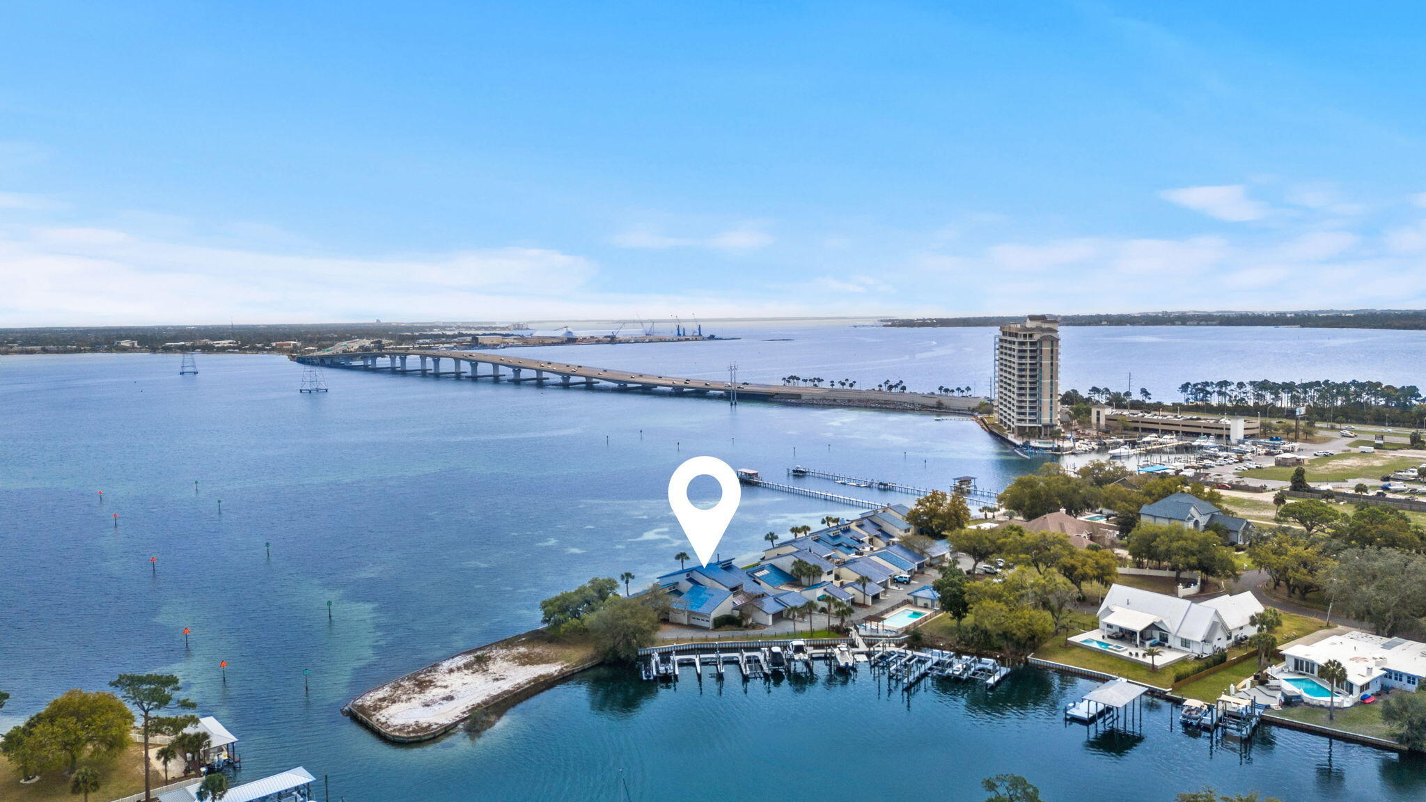 Welcome to 425 Bay Shore Drive, Unit 11, a stunning bayfront residence in the heart of Panama City Beach, FL. This spacious 2,000 square foot home offers two bedrooms and two and a half bathrooms, providing ample space for comfortable living. The property features direct access to a marina and includes an assigned private boat slip, making it an ideal choice for boating enthusiasts. Enjoy breathtaking views and serene surroundings in this prime location. With its desirable amenities and prime waterfront position, this property presents a unique opportunity for those seeking a luxurious coastal lifestyle.