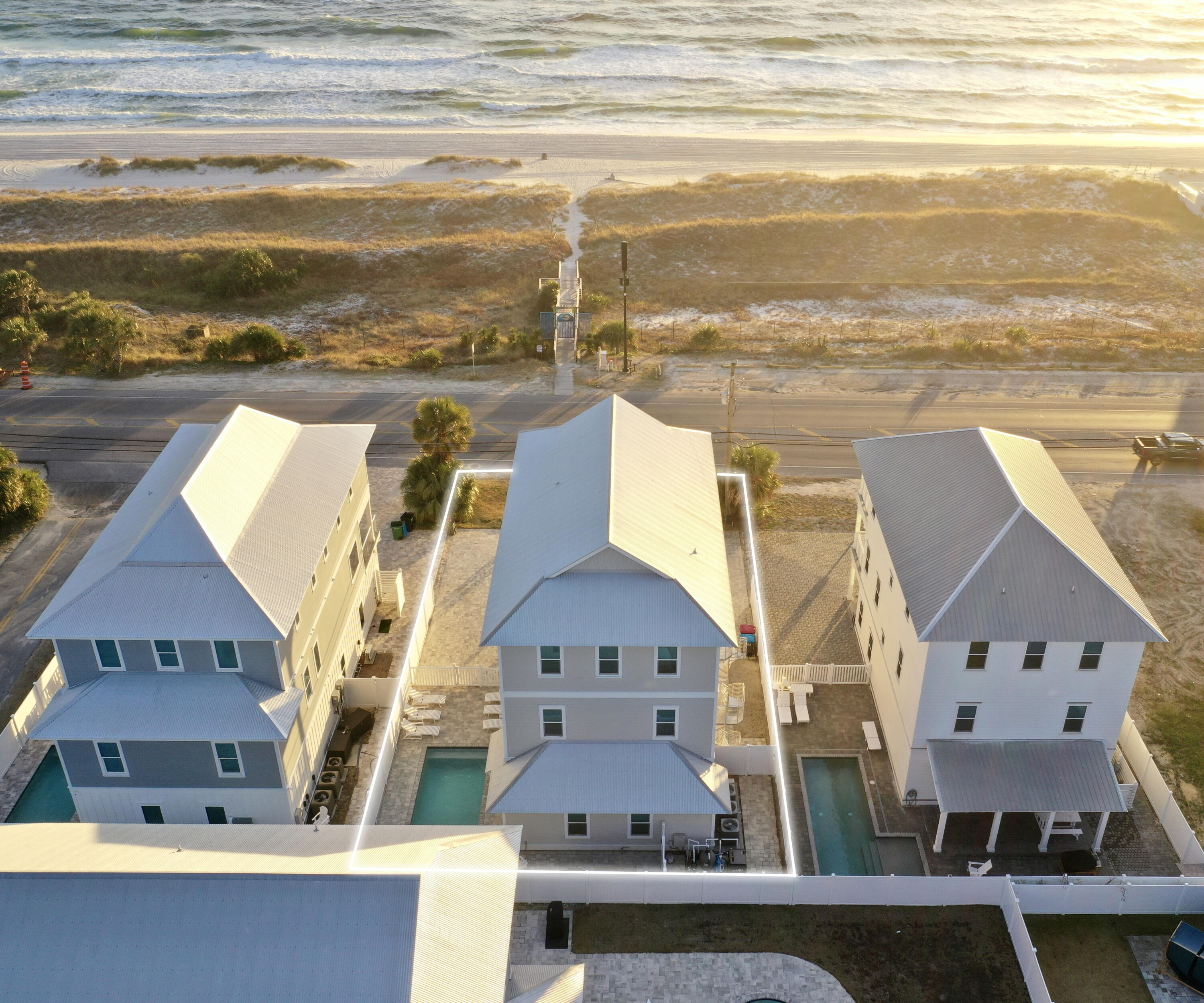 Discover Gulf Front Elegance at Bid-a-Wee Beach - A Luxurious Retreat Awaits. Step into a world where luxury meets the serene beauty of the Gulf of Mexico at this exquisite gulf-front home, offering unparalleled views and direct access to the pristine white sands of Bid-a-Wee Beach. Designed with the discerning family in mind, this home is a sanctuary of relaxation and entertainment, where every detail caters to a life well-lived. Opulent Living Spaces: A Blend of Comfort and Elegance Spanning approximately 4,390 square feet, this majestic residence features 6 bedrooms and 6.5 bathrooms, each meticulously crafted with luxury finishes and designed to offer an oasis of comfort. The massive 600ft bunk/rec room promises endless family fun, creating a perfect blend of lavish living and playful leisure. Entertainer's Dream: From the expansive decks, immerse yourself in breathtaking views of the Gulf, or indulge in the private heated pool, your personal haven of relaxation. The first level welcomes you with an inviting living room, a bedroom with an ensuite, and direct access to the outdoor pleasures that await. Culinary Delight: Gourmet Kitchen and Elegant Dining The heart of the home on the second level features the kitchen, dining area, and great room, all framed by panoramic Gulf vistas. Whether hosting a grand dinner or enjoying a quiet meal, the backdrop of the Gulf enhances every moment. Serene Retreat: Luxurious Bedrooms with Ensuite Comfort Ascend to the third level, where the master suite offers a serene escape, complete with Gulf views and a spa-like master bath. Additional bedrooms, each with their own ensuite, provide privacy and comfort for family and guests alike. Prime Location: The Best of Panama City Beach Situated in the vibrant heart of Panama City Beach, this home is a stone's throw from popular attractions, exquisite dining, unique shopping, and vibrant nightlife. With easy access to Hwy 98, explore the delights of Pier Park or venture to the nearby airport with ease. A Call to Luxury: Schedule Your Visit Today This is more than a home; it's a lifestyle promise. With ample parking, an outdoor shower, and a setting that's simply irreplaceable, your Gulf front dream awaits. Don't miss the opportunity to experience this sanctuary of sophistication and tranquility. Schedule your visit and step into your future where every day is a vacation. Your Gulf Front Luxury Awaits - Discover, Dream, Dive In.