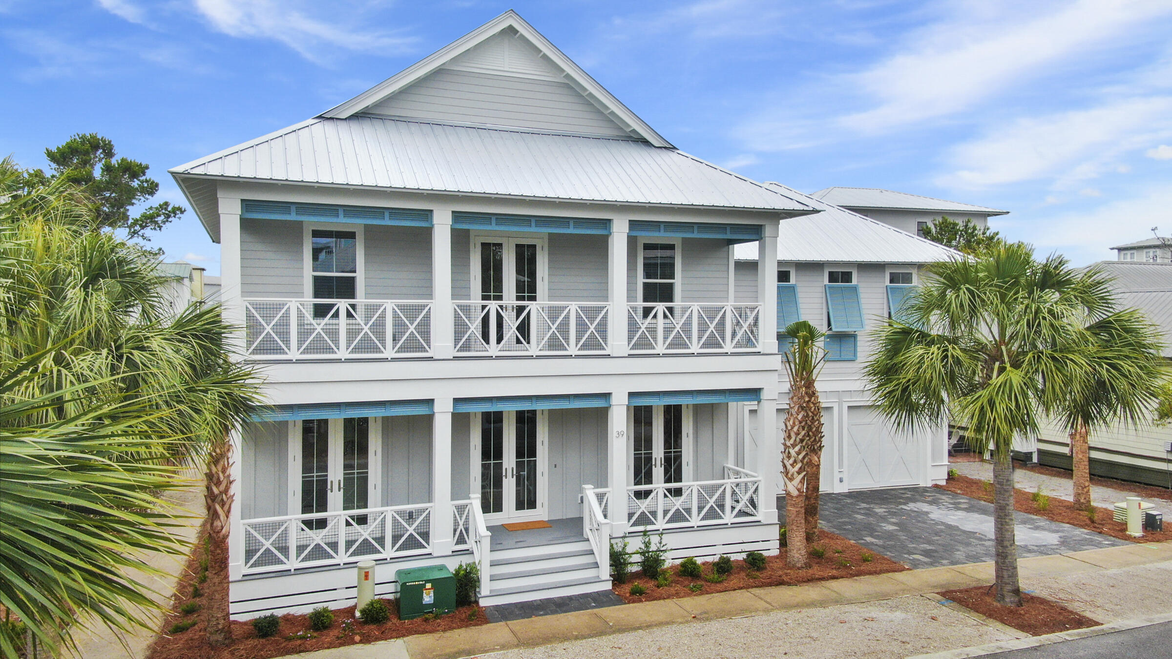Very rare to find a main house and carriage house with a 2-car garage in Seacrest Beach. This beautifully decorated and recently constructed home (completed in May 2021) home overlooks green space and is a short walk to the 12,000 SF community pool. Main house consists of 4 bedrooms and 4 baths. The first floor consist of the open-concept floor plan with the kitchen, dining and living rooms, along with a guest bedroom, guest bath, laundry room and spacious screened porch. The 2nd floor consists of a bunk room with 4 twin beds, a guest bath with a tub/shower, an additional guest bedroom with ensuite bath and the master suite. There is also a sitting area on the 2nd floor. Other features include, hardwood floors throughout, designer tile floors in the baths, tiled showers shiplap accent walls,, almost 600 SF of porches and a 552 SF 2-car garage. Also in the garage is a washer/dryer for the carriage house. Seacrest Beach offers a private beach shuttle to take you to and from the private deeded beach access. The home grossed almost $100k in 2021 with rentals from the end of May thru the end of August. Projections for a full year are $157k. Home is sold fully furnished and rental ready. Buyer to verify all information and dimensions.