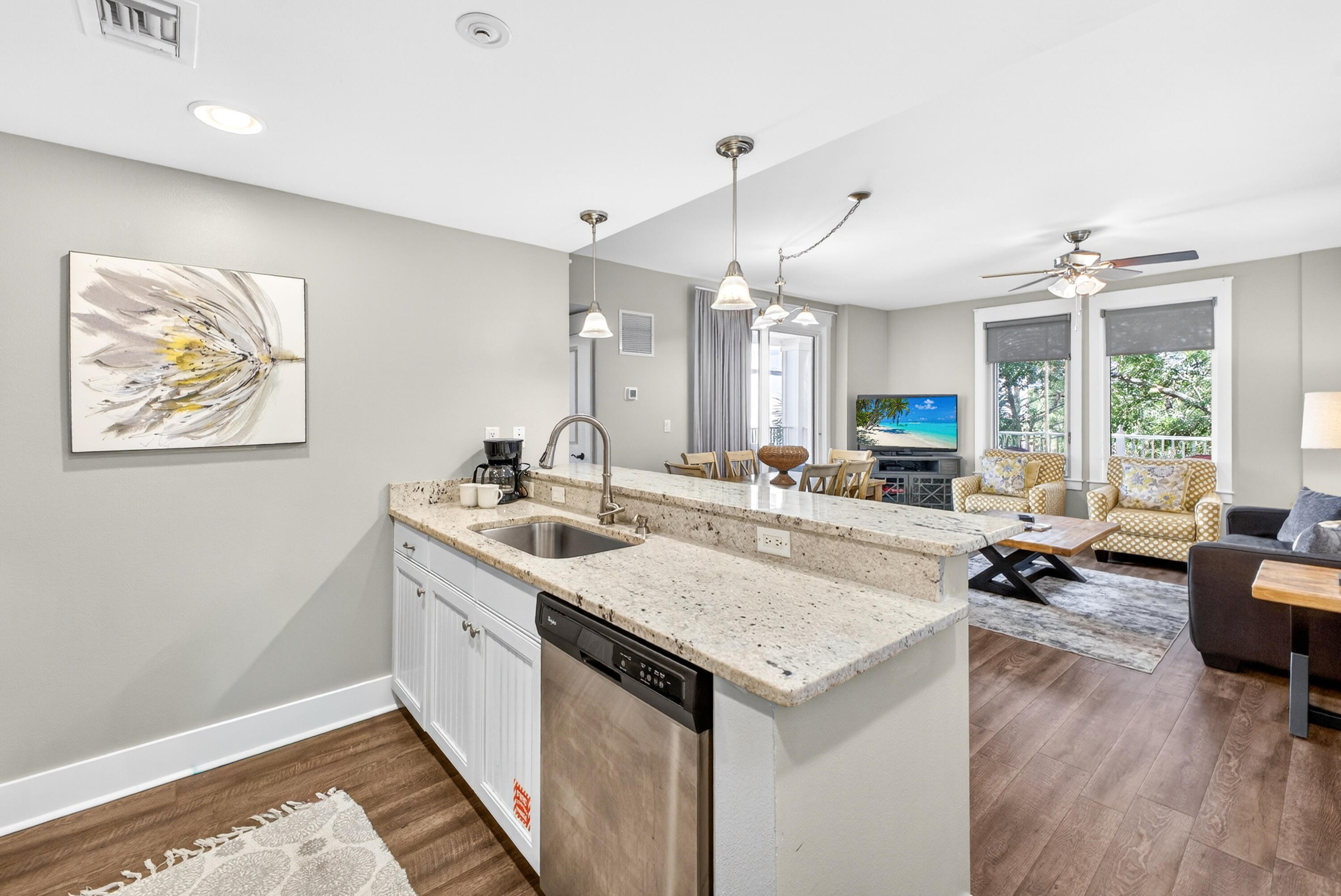 Located on the 3rd floor of Pilot House, this beautifully updated and fully furnished 2-bedroom lock-off offers excellent rental flexibility and income potential. The unit can be rented three ways-as a studio, 1-bedroom, or full 2-bedroom. The main living area features granite countertops, stainless steel appliances, and durable hard-surface flooring throughout for easy coastal living. The 1-bedroom side includes a bathroom with granite countertops and a double vanity, while the studio side offers two beds, a full kitchenette, and a full bathroom. Relax on the private balcony overlooking a lush, tropical setting-perfect for unwinding after a day at the beach or enjoying time with family and friends. As an introduction to the Sandestin lifestyle, we invite our new owners to explore amenities that make Sandestin special. The listing brokerage and seller(s) are presenting the buyer(s) of this property with (2) 90-minute rounds of Tennis court time, a golf foursome at one of our three championship courses, and a round of golf for up to four (4) players at the unrivaled Burnt Pine Golf Club.

Sandestin Golf and Beach Resort features more than seven miles of beaches and pristine bay front, four championship golf courses, 15 world-class tennis courts, a 226-slip marina, a fitness center, spa and celebrity chef dining. Shop, dine and play at the charming pedestrian village, The Village of Baytowne Wharf and more. Inside the gates of the resort, residents enjoy a balanced lifestyle of high-class living, spanning the 2,400 acres from the beach to the bay. Everything within the gates of the resort is accessible by golf cart or bicycle. The entire resort is interconnected by miles of pedestrian, bike and golf cart paths that weave through groves of live oaks, meandering past natural lagoons, fountains, man-made lakes, and meticulously landscaped fairways.