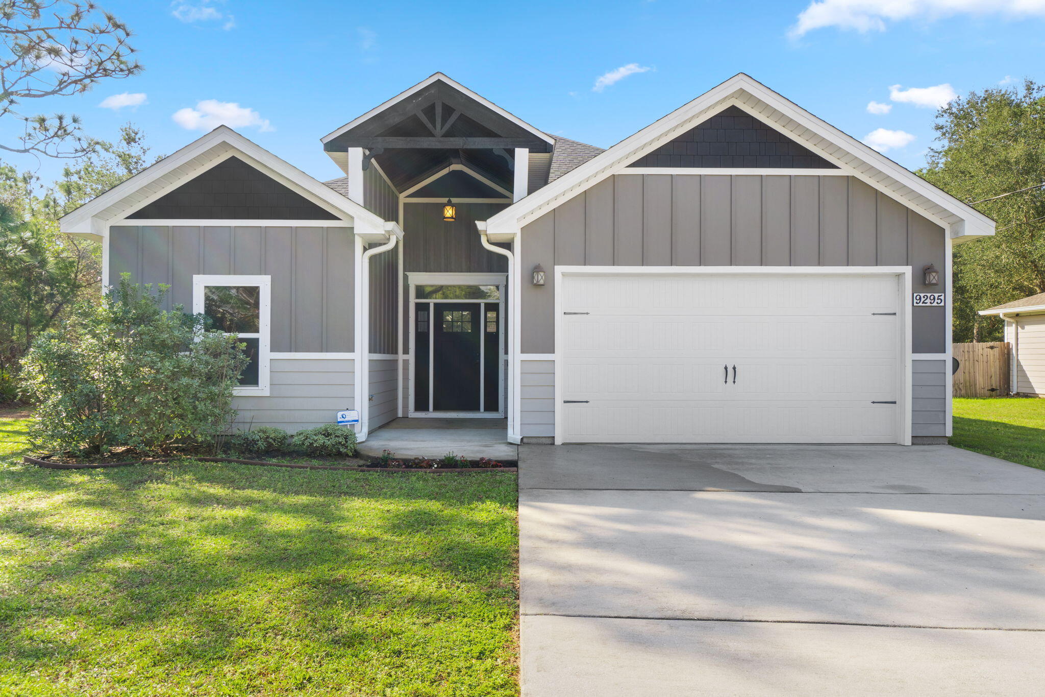This stunning 4 bedroom, 2 bath home is situated on just over half an acre & offers a rare opportunity for you to live the ultimate Florida lifestyle. There is no hoa, which means that you have the flexibility to use this property as a primary residence, a secondary vacation home, or an investment property. This property is perfectly situated for those who want to be close to everything. Conveniently located within minutes of Navarre Beach,local restaurants,& shopping,as well as military bases.The home itself is bright,spacious,& thoughtfully designed, with an open concept living area that is perfect for family gatherings & entertaining. The kitchen is perfect for the chef in the family! Modern appliances,granite countertops,shaker style cabinets with plenty of storage space & a large center island perfect for preparing meals or hosting guests.
The bedrooms offer plenty of privacy, ensuring that everyone has their own space to relax and unwind. The bathrooms are modern and well-appointed, with sleek fixtures & granite countertops. 
Step outside & you'll find a well-manicured lawn perfect for outdoor activities or entertaining. The backyard also features a covered patio, providing the perfect spot for outdoor dining or relaxing with a good book. With its desirable location & attractive features, this home is a true gem that's sure to please. Don't miss the opportunity to make it your own!