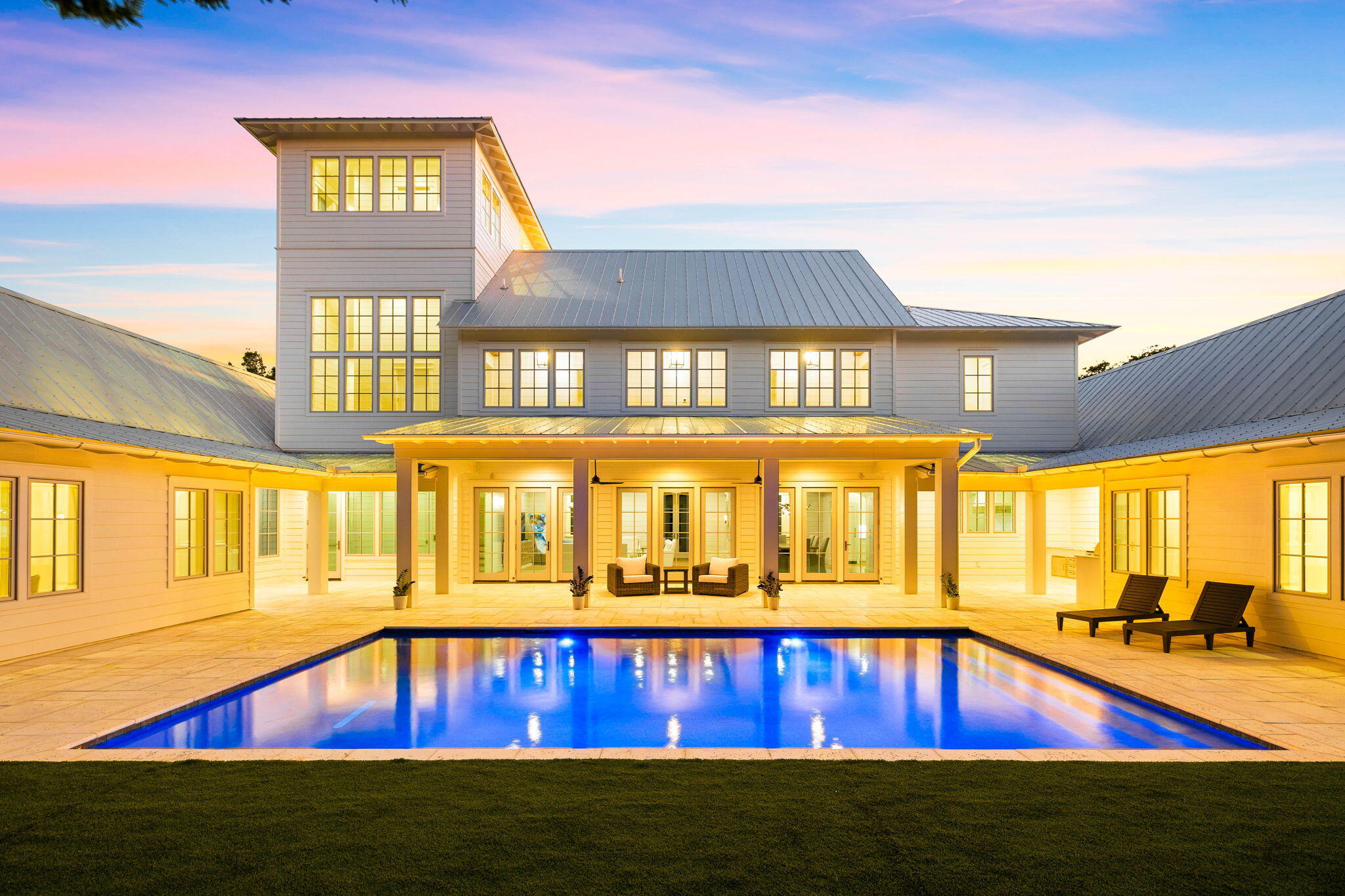 Primely positioned and beautifully designed, 40 Whispering Wind Way is a newly built legacy retreat located within the exclusive gated enclave (no short term rentals) of Bannerman Beach which offers 3.4 acres of private deeded beach access for it's boutique 19 lot plat and is directly adjacent to Grayton Beach State Park along the pristine 30A coastline. This custom-built estate is the epitome of private living, designed with Hamptons-style qualities that maximize the half acre lot size boasting exquisite amenities such as a private pickle ball court, spacious private pool and surrounding pool deck and sweeping gulf views from the third floor tower. The exterior architecture of this residence is a work of art, adorned with authentic reclaimed wood beam accents and artisan-sourced brickwork, creating a captivating facade that is sure to leave a lasting impression. Notably, it stands as the only private home on 30A with its very own private pickleball court, adding a rare and appealing dimension to the property. Bannerman Beach is located south of 30A, allowing its owners exclusive access to one of the most private stretches of beach in North Florida.

The home also offers breathtaking Gulf views, further enhancing its allure. With 6 bedrooms, 6.5 bathrooms (primarily laid out over a single level) and a sprawling 6,347 square feet of living space, this home provides ample room for both relaxation and entertainment. It features a heated 16x30 pool, a private elevator, a spacious third-floor viewing deck with prominent Gulf views, and a built-in outdoor kitchen. Additionally, hand-selected furniture and lighting packages complement the home's style, and a unique beach lobby area welcomes you to the coast. Dual primary suites on the first floor provide convenience and comfort, and the 3.4-acre private beach access is exclusively available for the gated neighborhood residents. Exceptional lot positioning with over half an acre of land and reclaimed beams imported from Canada add to the property's character.

Bannerman Beach is an unparalleled neighborhood that remains notable for it's gated privacy and exclusivity while still allowing excellent proximity to both the east and west ends of 30A including immediate adjacency to Grayton Beach, FL as well as the epicenter of 30A in Seaside FL. Each lot boasts a minimum of half an acre significantly reducing the overall density and maintaining a non rental status that elevates it's privacy and security.

Please reach out to us today for the cost-to-own figures for the property.