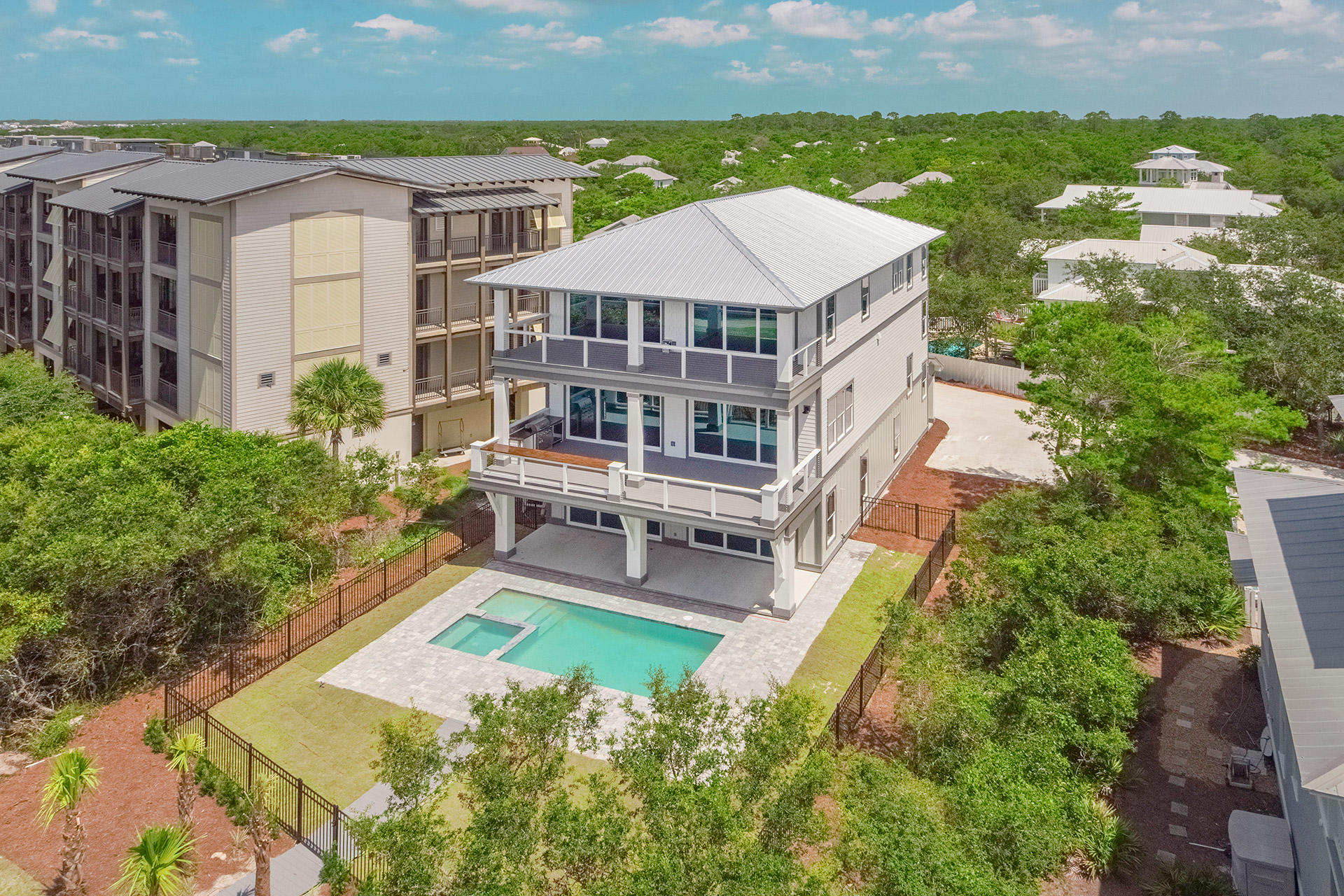 Here is your chance own a luxury 7 bedroom home with gulf views.  This impressive 30-A residence offers a deeded beach access just steps away and an outdoor kitchen on the second balcony over looking the pool and jacuzzi. This 5,200 sq ft three-story property with elevator has a proven design and was crafted from the ground up with vacationers in mind. Current projections surpass $250,000 in rental revenue in its first year with an anticipated increase in income once the home has been established in the market. Located against the North side of 30-A you are only a few minutes drive to Rosemary Beach, Aly's Beach and The HUB entertainment complex. This home has 3 wet bars; one in each upstairs master and on the bottom floor.  The upstairs masters have auto fill Keurig's for your convenience