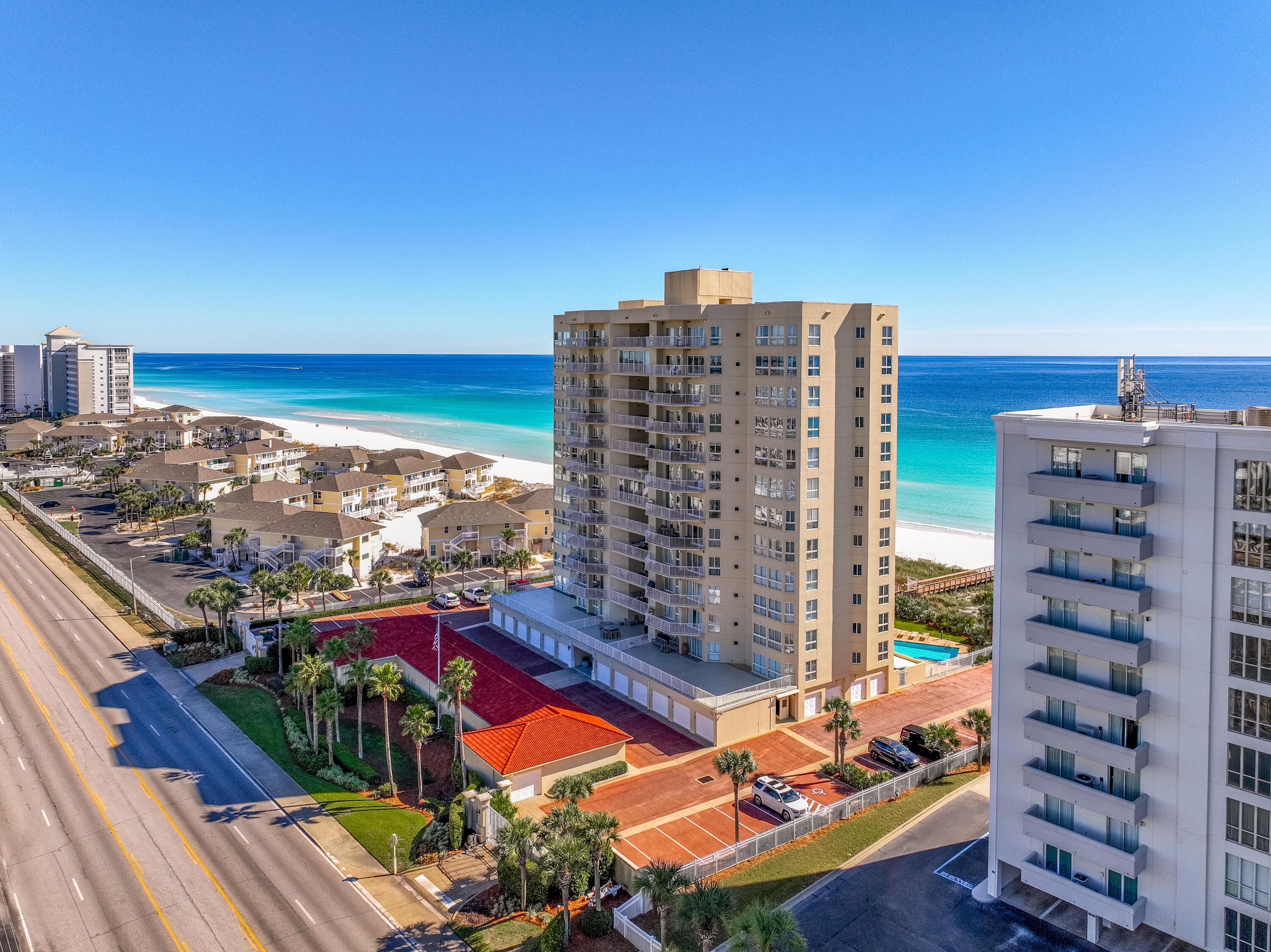 Discover the pinnacle of beachfront luxury in Penthouse 1 at Holiday Isle Towers, an ultra-private, NON-rental Gulf-front community with only 36 residences. From your elevated vantage point, experience the magic of the Gulf—brilliant sunrises, golden sunsets, and uninterrupted views that feel like your own personal horizon. Security and serenity abound with a gated entrance, an access-controlled resident lobby, and coded beach entry—creating a private retreat rarely found on Destin's coastline. Inside, this expansive penthouse lives like a spacious coastal home. Two Gulf-front primary suites, each with ensuite baths, invite you to wake up to waves crashing below. Two additional bedrooms overlook the Harbor, creating a rare dual-waterfront experience. Two generous living areas offer the perfect blend of relaxation and entertaining space. A large kitchen with abundant cabinetry, ample storage, and a dedicated wet bar area pairs convenience with elegance. A fireplace adds warmth and ambiance to the main living space. Thoughtful touches enhance everyday ease, including a garage and two sizable ground-floor storage roomsideal for beach gear, bikes, or seasonal items. This residence offers more than a homeit delivers a feeling of exclusivity, calm, and the effortless beauty of true Gulf Coast living. Opportunities like this simply don't come around often.