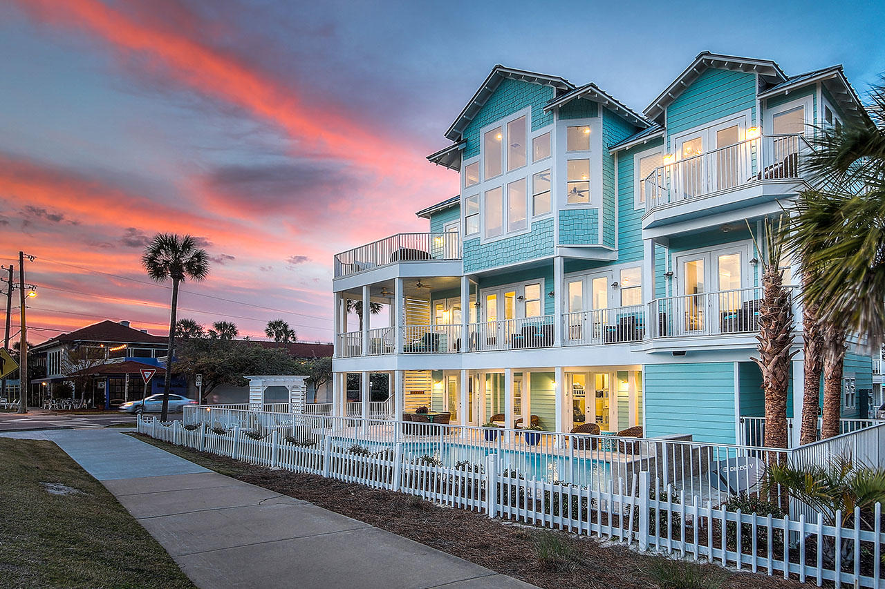 Eat, drink, cook, swim and socialize in this fantastically whimsical let luxurious new home. This unique home is 60 feet wide and backs up to scenic Gulf Drive. The extra width f this corner lot allows for larger gathering rooms, kitchen and entertaining area. Top floor has ceilings that soar to over 15' with tons of glass and patio areas to sit and enjoy the Gulf Breezes. Top of the line everything. All interior floors travertine or marble. 10' ceilings on 2nd floor. Game and Bunk rooms on main floor. Outdoor swimming pool and kitchen, bathroom and changing area. Bose surround sounds, specialty woods used in interior, gourmet kitchen with 2 dishwashers, ice maker, beverage center, 48'' s/s Liebherr Refrigerator and dual fuel Bertozonni range oven. Designer furnishings, drapes *Investors this brand new home has had 23 bookings since it was finished April 2017! Great Investors property!