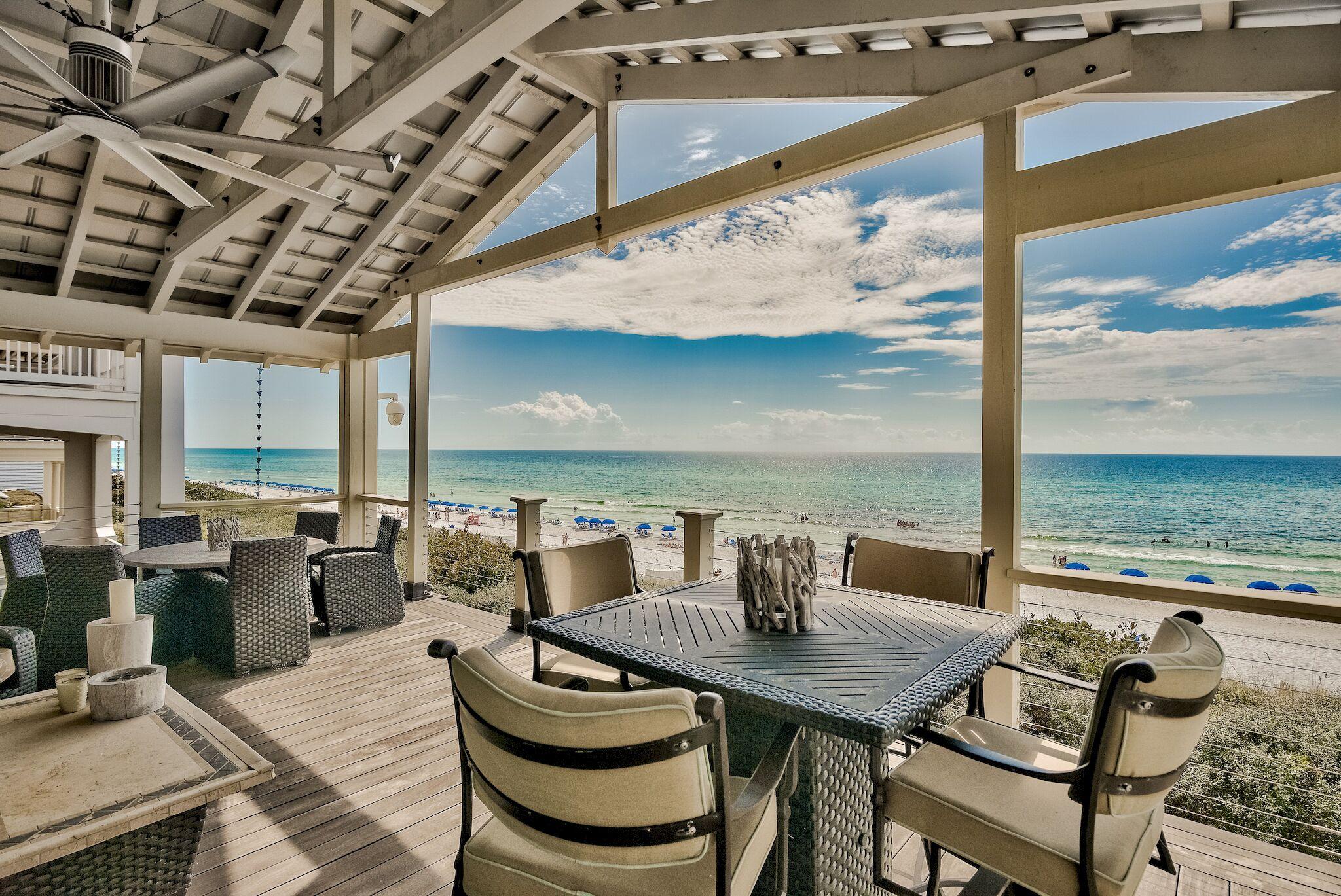 Very seldom do opportunities like this come to market. This eloquent gulf front home, designed by the same architects who helped design Seaside. It is the epitome of beach front wholesomeness. Seaside being one of the first communities designed in the principles of New Urbanism, the town itself is the topic of slide lectures in architectural schools and in housing-industry magazines. This is one of the largest gulf-front homes available in the Seaside community. This home has limitless and captivating views of the Gulf of Mexico and is located steps away from the iconic Bud and Alleys.
Designed with the idea of embodying southern charm and modern sophistication which, will appeal to the most particular owner. Acquiring inspiration from the beautiful Seaside Chapel, the vaunted ceilings along with three new HVAC units. This home uses windows and balconies to the utmost degree to create an effortless and everlasting view of the Seaside Beaches. 

Custom Oak floors carry throughout all levels of the home while the Master Bedroom was masterfully placed with a beautiful Gulf view aided by an expanded covered balcony. The extraordinary Master Bathroom with its separate his and her spaces and well-appointed marble floors, only adds to the luxurious divinity of this Master Suite. The kitchen is well dressed with white marble countertops specifically selected to give the ambience of coastal luxury. Its professional appliance package would make any chef right at home. The outdoor living space offers complete relaxation with the availability to host your guests and take in the serene view of the Gulf of Mexico.  To truly appreciate all this residence has to offer, one must view it in person.