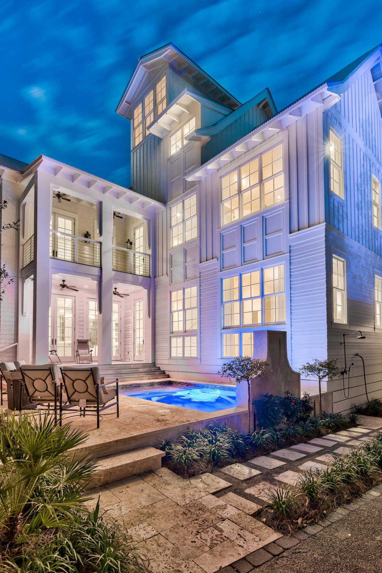 This luxurious home situated on a corner lot one block from the Gulf in Old Seagrove is the ideal beach home. Boasting 6 bedrooms, 7 bathrooms, this home offers plenty of room to relax with its spacious, open-concept floor plan and 4,611 sq ft. Features of this home include a gourmet kitchen, oak floors, shiplap walls, carrera counter tops, 12' oak beamed ceilings, floor to ceiling windows, 2 master bedrooms (one located on the 1st floor, the other on the second floor), ensuite baths, private pool, and a circular staircase that takes you to the tower to view the beautiful Gulf Coast sunsets. Not only is it a short walk to the beach, but this home is close to some of 30A's best restaurants, shopping and only half a mile from the Seaside town center. It's a  perfect opportunity for a primary residence, second home or investment property!

Buyer is responsible for personally verifying details about this property. Any information contained in this listing is believed to be accurate but is not guaranteed.
