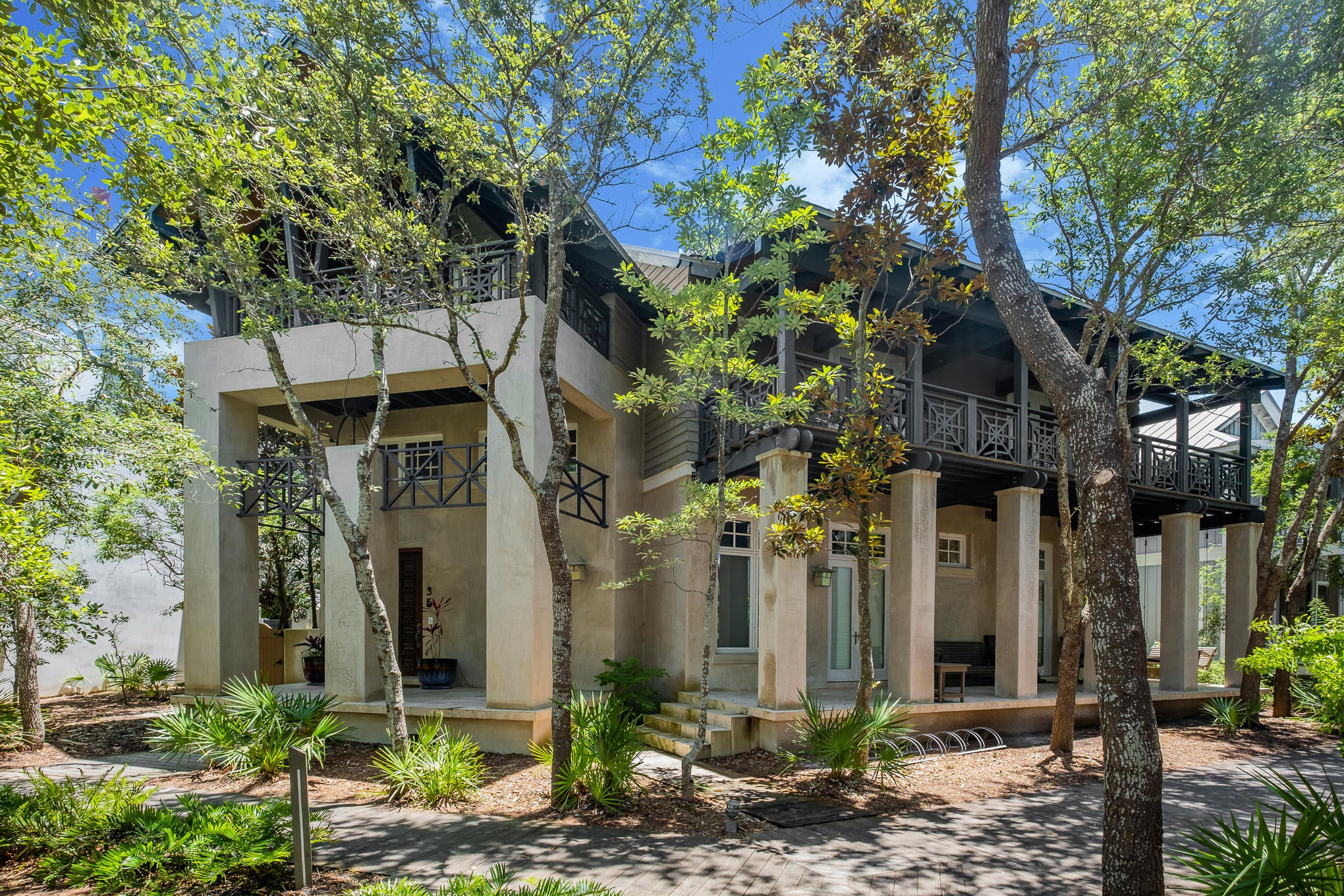 Superbly located and abundant in its size, 35 Wiggle Lane is a unique value for a Rosemary Beach home.  More than 4,600 square feet of heated and cooled living space, along with approximately 800 square feet of finished porches and an impressive central courtyard, combine to create a grand and inviting retreat for owners and guests.  

Main living spaces feature an open living plan, Wolf and Subzero appliances, a wine refrigerator, an ice maker, breakfast bar seating for 5, a separate dining room, and a comfortable gathering area.  A first floor master suite features dual bathrooms. The the space above features its own full kitchen and living area; which can function as the home's second space, where groups can congregate.  A second master suite, situated in a quiet corner of the home is superior in every right to nearly any master bedroom in the community.  

The home's atrium, a 3-story stairwell, features multiple sitting spaces in which to read, relax, and repose.  

3 additional guest bedrooms finish out the main house.  The first and second level can operate as lockouts, in addition to the home's one-bedroom carriage house.  The effect of which is that the property is a true compound, which if needed can accommodate 3 separate families.  

Central to the home's layout is its patio with summer kitchen.  With doors opened to the courtyard and a fire lit in the built-in chiminea 35 Wiggle has everything you need after a fun day at the beach while being a mere stones throw from all of Rosemary Beach's central amenities.