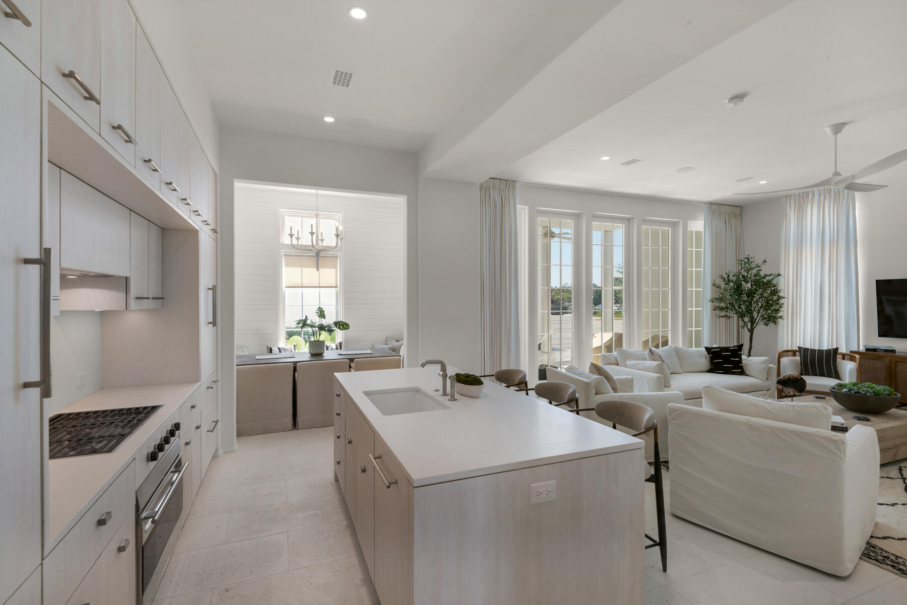 Unbelievable 3 Bedroom 3.5 Bath townhouse residence on the most exclusive end of 30A.  Bordering Alys Beach and walking distance to Rosemary Beach, this townhouse is located in the newest and most exclusive development on 30A at the corner of S. Watersound Parkway and Highway 30A. Designed by renowned Khoury Voigt architects and developed by Romair,  no detail was overlooked. The stately palms and cobble stone roadways greet you as you approach the town center's fountains and become immersed in white Grecian stucco structures in this tranquil community. Being an end unit, this gorgeous space has more windows than the interior townhomes, which means there is tons of additional natural light to the 2,496 sq ft of interior living space. There is also almost 900 sq ft of covered outdoor  terraces, and an over-sized 2 car garage.   The designer upgrades on this property include: bianca carrera marble bathrooms, Caesarstone countertops in the kitchen, Subzero and Wolf appliances, Waterworks kitchen and bath plumbing fixtures, concrete pavers, and stained white oak flooring.  First floor is very spacious and open with chef's kitchen and beautiful center island with ample storage and separate dining alcove.  The second floor includes the Master suite with private balcony and 2 additional bedrooms both with en-suite baths.  The townhomes enjoy exclusive use of a community pool and cabanas that are just steps off the front porch.  The architectural elements within this new development are above anything else on 30A.  This unit is being sold fully furnished and ready for permanent living or vacation rentals.  Owners and guests will enjoy a private beach access in addition to nearby world class shopping, dining and entertainment.