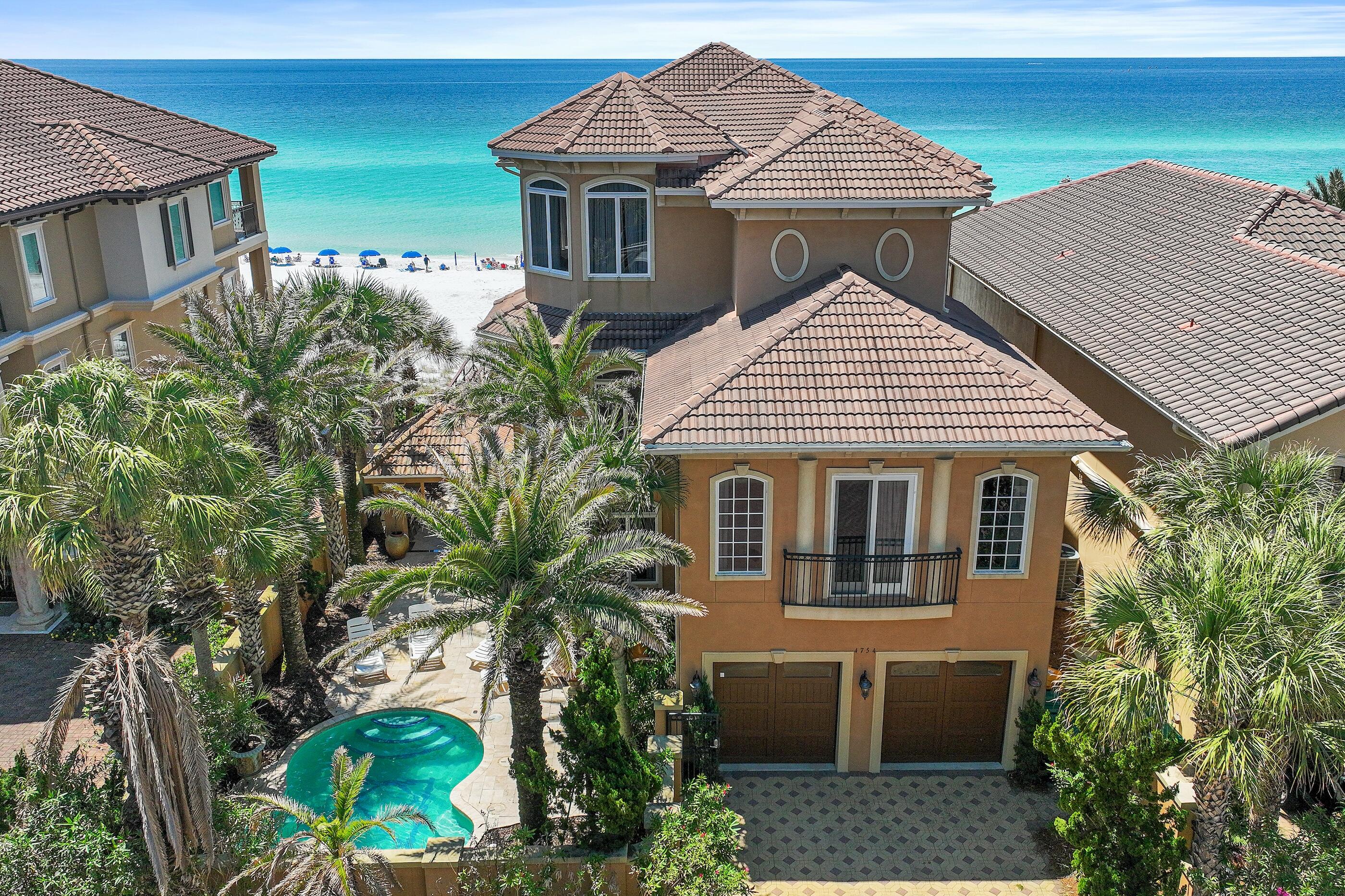 Welcome to 4754 Ocean Blvd, a breathtaking Gulf-front retreat in the exclusive Destiny by the Sea community. This 7-bedroom, 6.5-bathroom masterpiece offers unparalleled views of the emerald waters, a private pool and  beach walkover, and luxurious amenities that redefine coastal living. Step inside to an elegant open-concept design featuring floor-to-ceiling windows, allowing natural light to illuminate the designer finishes and high-end craftsmanship throughout. The chef's kitchen boasts a premium gas range, Sub-Zero refrigerator, custom cabinetry, and a spacious island, perfect for entertaining. The expansive Gulf front balconies provide a front-row seat to the most stunning sunsets, while the private heated pool offers a serene escape just steps from the sugar-white sands. The main living area occupies the south portion of the first floor and is positioned to take full advantage of the sweeping gulf views.  The gulf front dining area is adjacent to the living room which features a media console, gas fireplace, and a wet bar which all flow seamlessly to the covered balcony which spans the length of the home offering stunning gulf vistas and ample lounge space.

Retreat to the primary suite, a true sanctuary with a spa-like ensuite bath and private terrace overlooking the waves with 180 degree water views.  The master is well equipped with an oversized walk-in closet, sitting area, media center, dual vanities, soaking tub, spacious shower, and laundry center.  There are also five luxurious guest suites for the enjoyment of family and friends.  Additionally, there is a stunning office with gulf views that is currently being utilized as a another bedroom.  For convenience and comfort, the home is equipped with an elevator and the 2-car garage provides ample storage and parking.

For entertainment, this home features a state-of-the-art movie room and multiple lounge spaces designed for relaxation. Also, there is a well outfitted laundry and powder bath on the main level.   Whether you're seeking a primary residence, vacation home, or lucrative rental investment, this estate offers it all.

Located in Destiny by the Sea, a prestigious gated community with 24-hour security, 3,000 feet of private beach, and resort-style amenities, this is coastal living at its finest.  This luxurious escape is secluded yet convenient to the heart of Destin and world class amenities including Legendary Marina, Destin Commons, WholeFoods, as well as local restaurants, boutique shopping, and local entertainment.